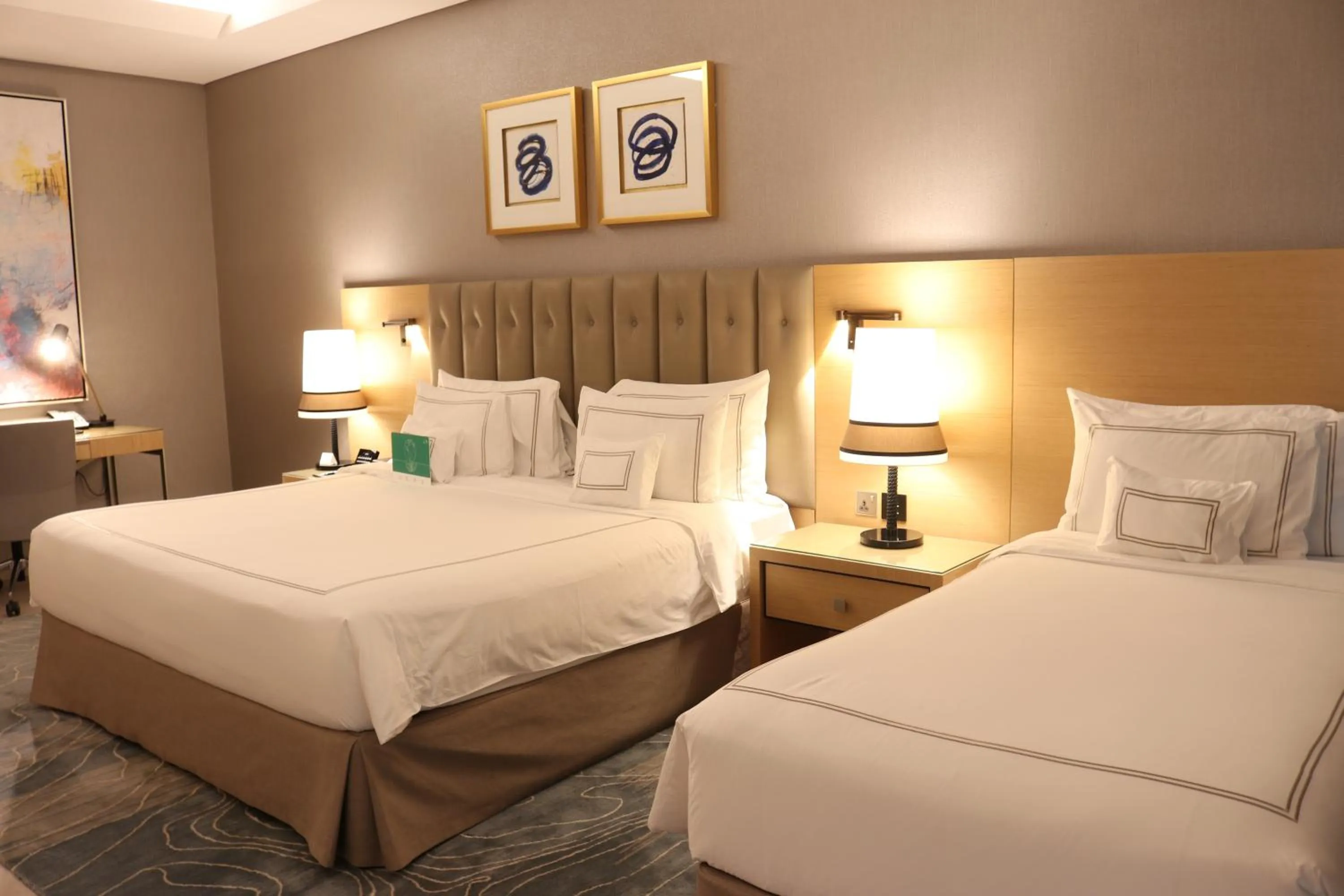 Bed in Grand Cosmopolitan Hotel