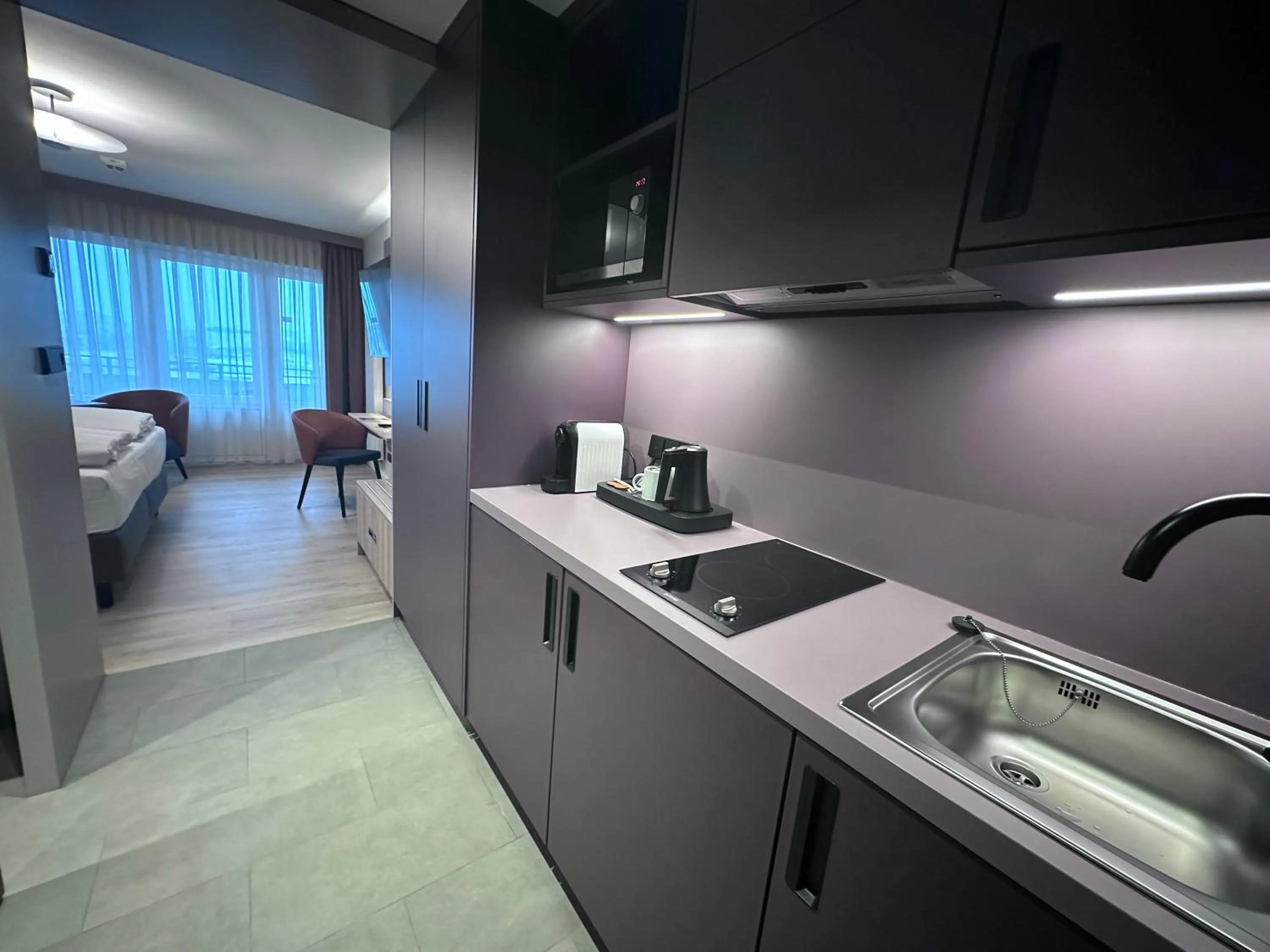 Kitchen or kitchenette in Apartment-Hotel Hamburg Mitte