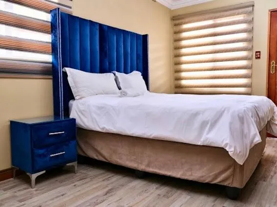 Bed in Lauren Palace Guest House