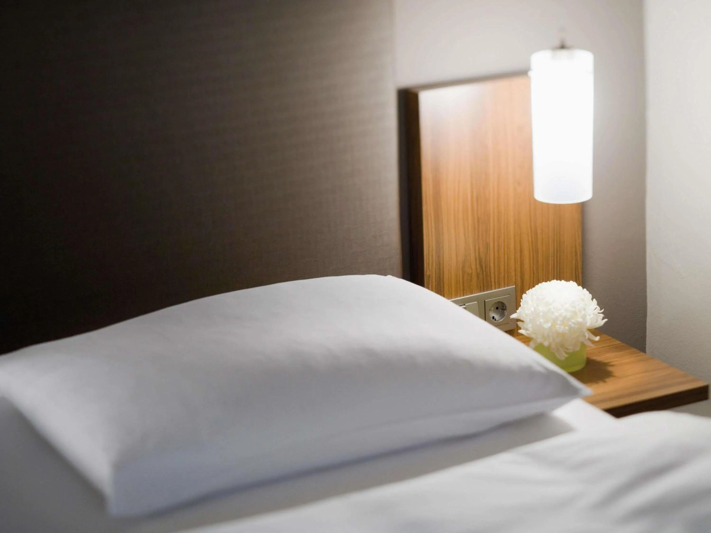 Bedroom, Bed in Mövenpick Hotel München-Airport