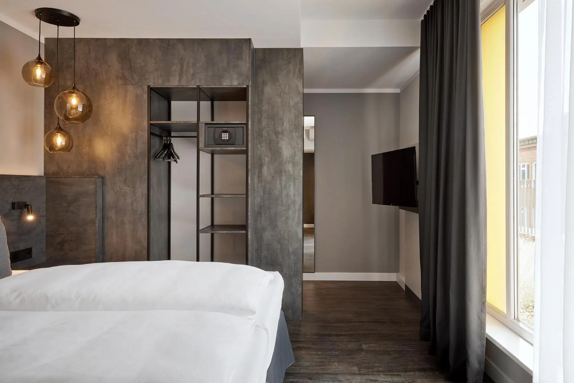 Bed in THE SCOTTY Hotel Hamburg