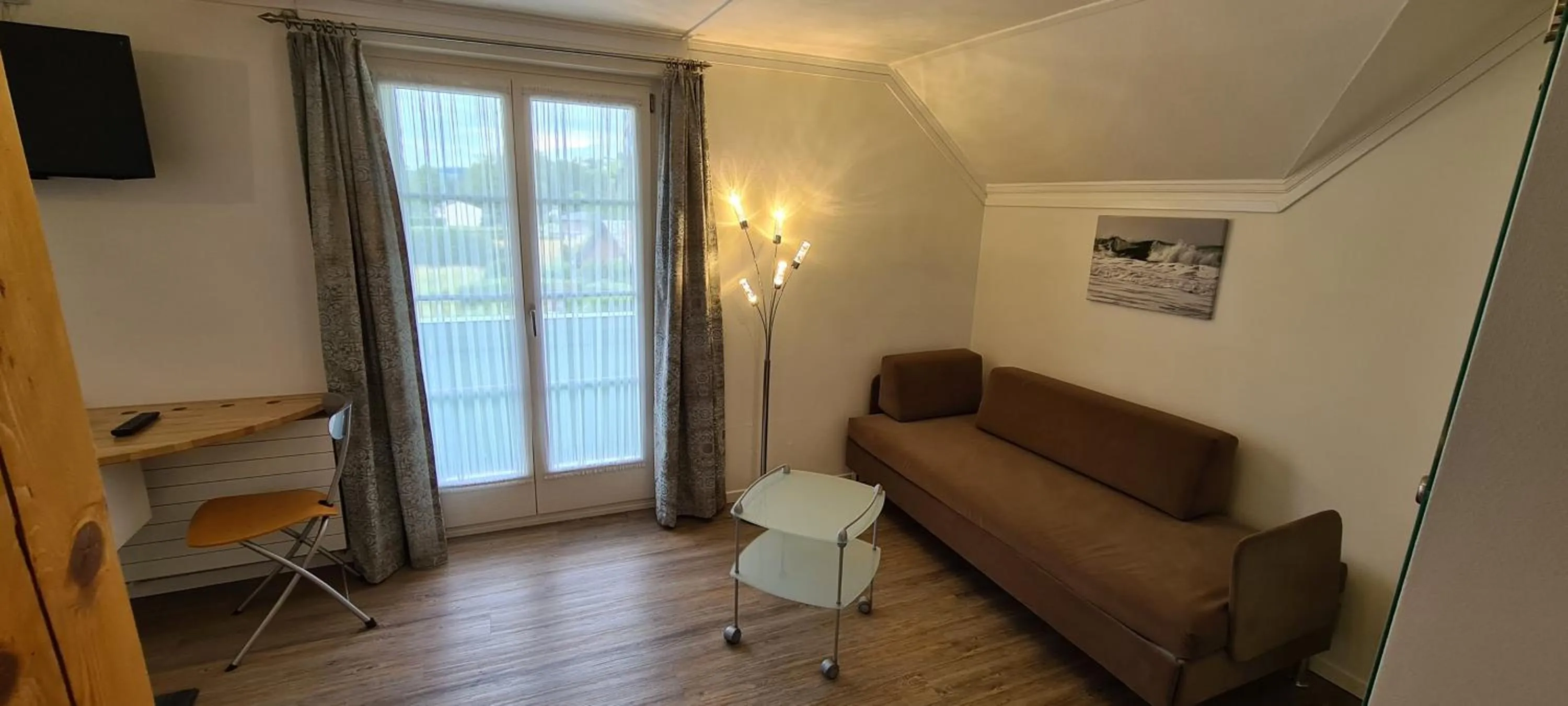 Seating area in Hôtel Restaurant Cave Bel-Air