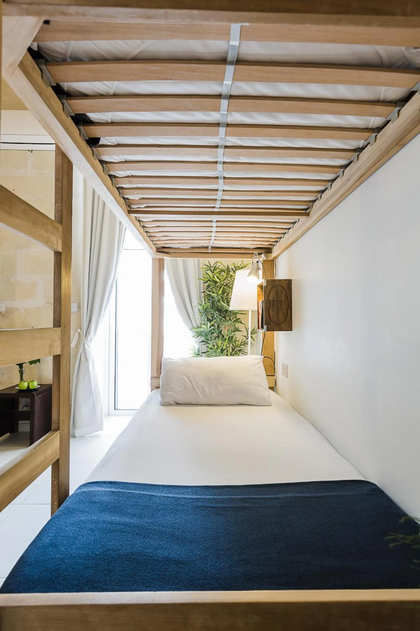 Bed in Two Pillows Boutique Hostel