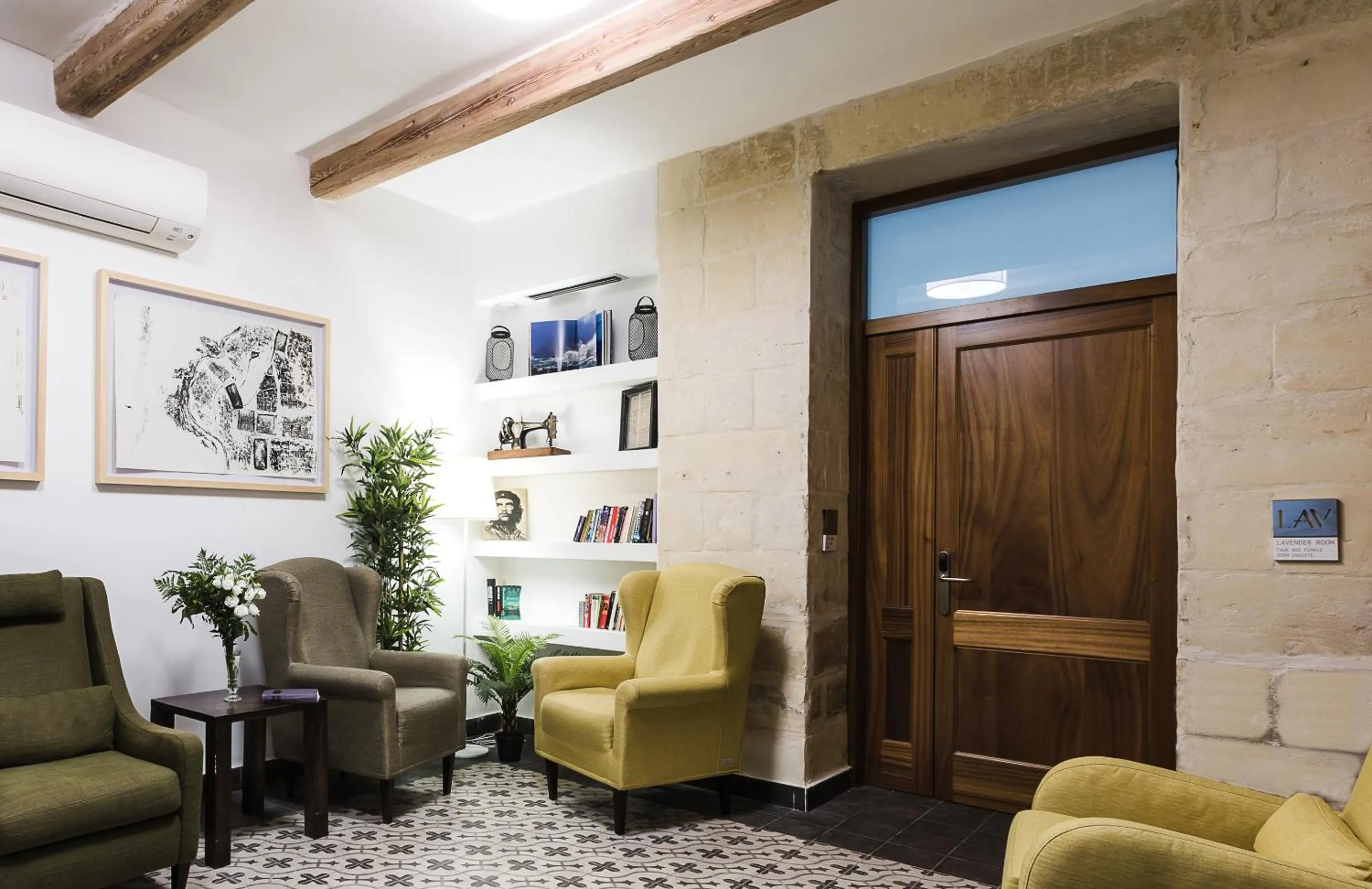 Communal lounge/ TV room in Two Pillows Boutique Hostel