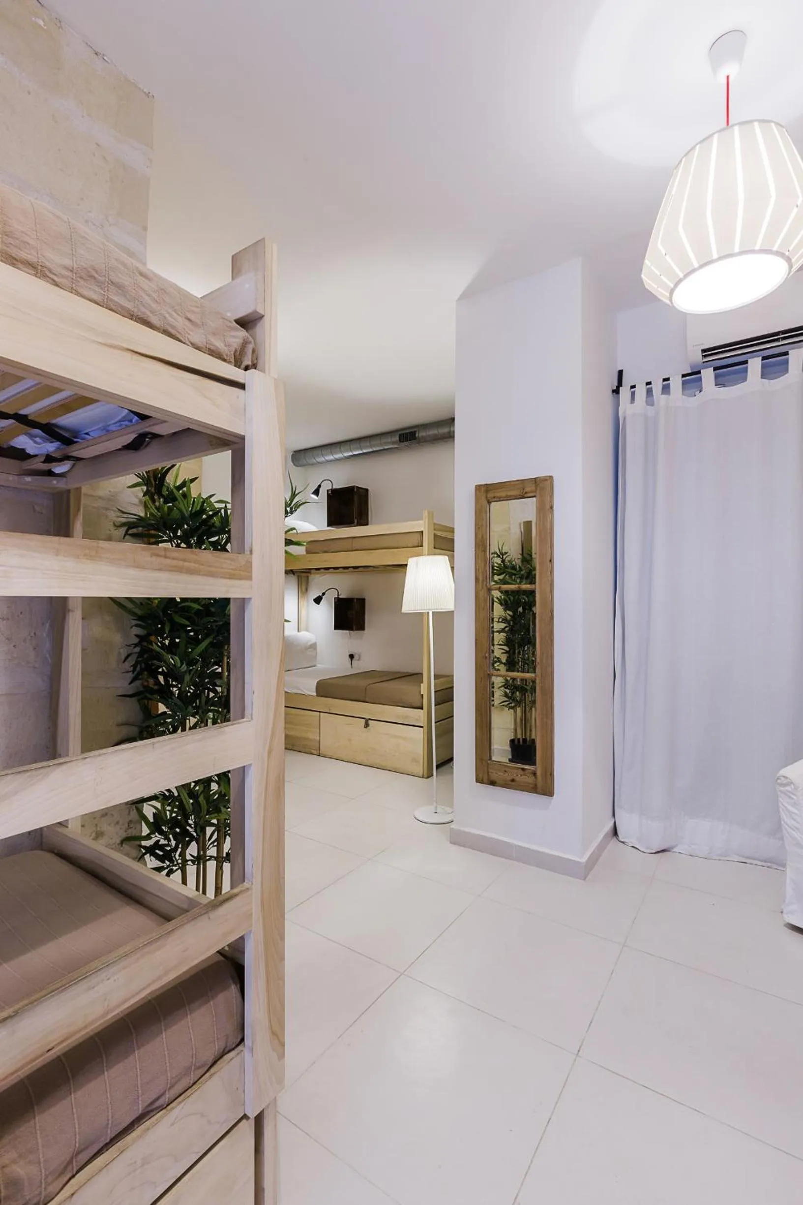 Bed in Two Pillows Boutique Hostel