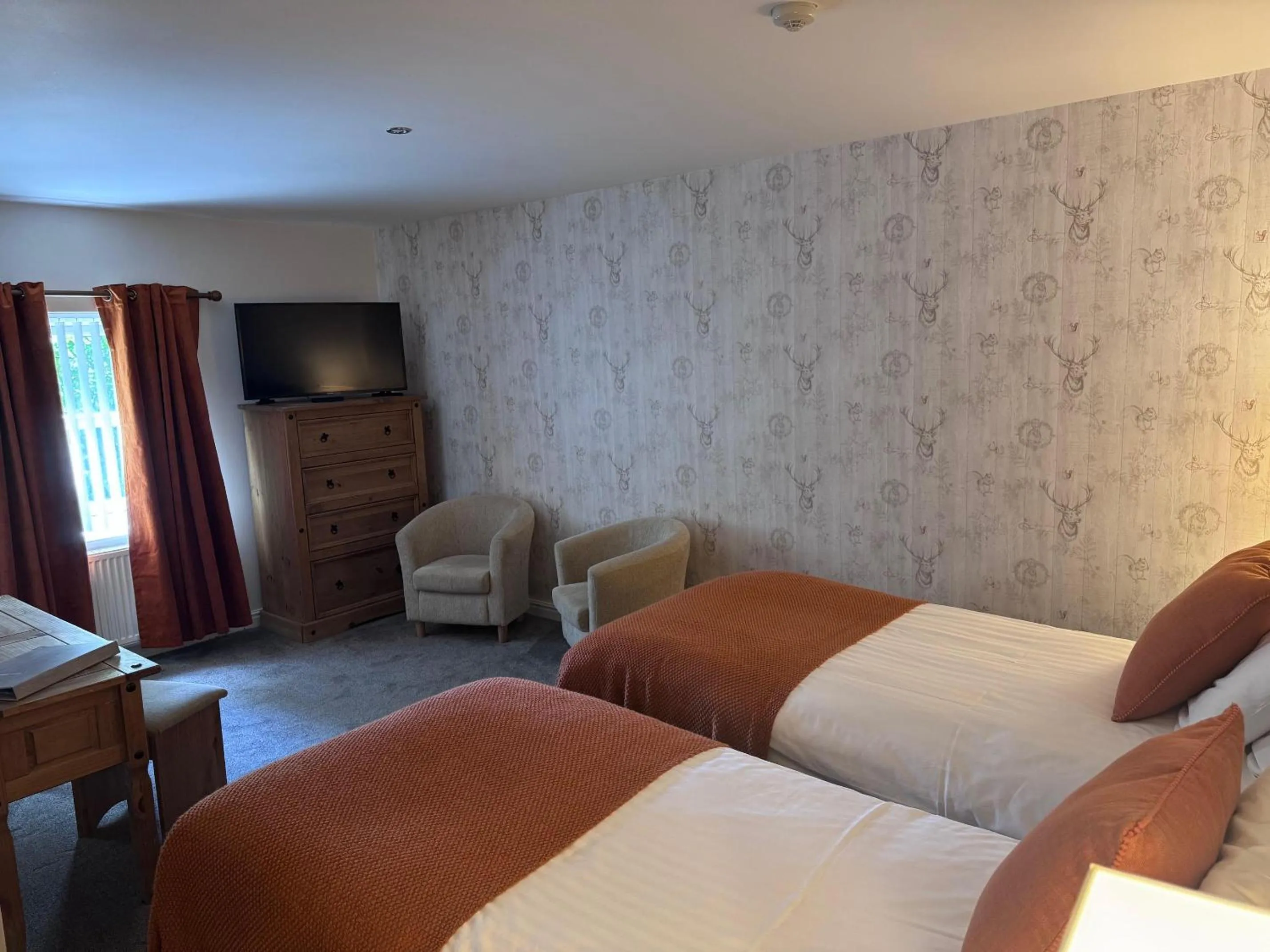 Bed in The Oaks Hotel