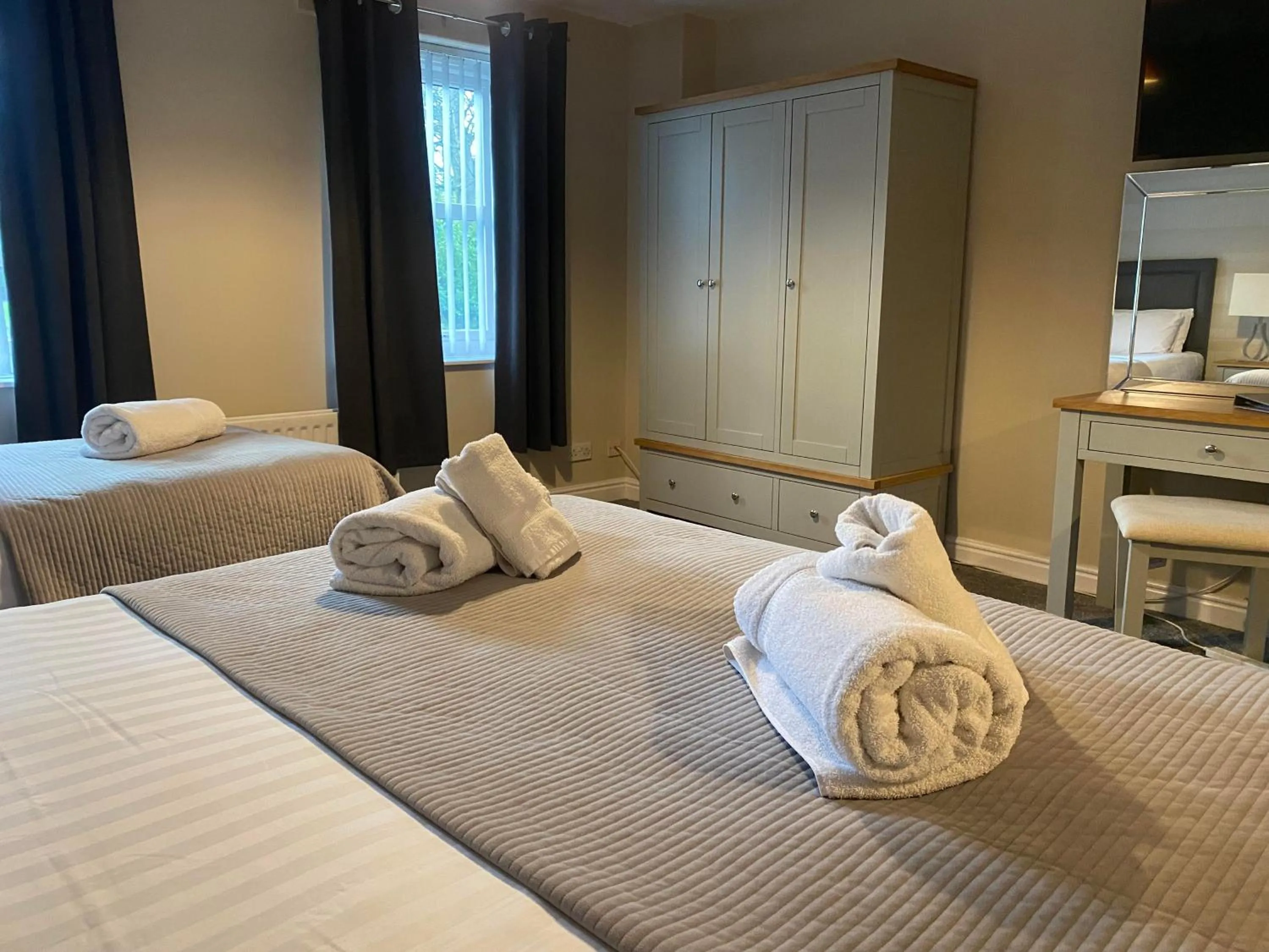 Bed in The Oaks Hotel