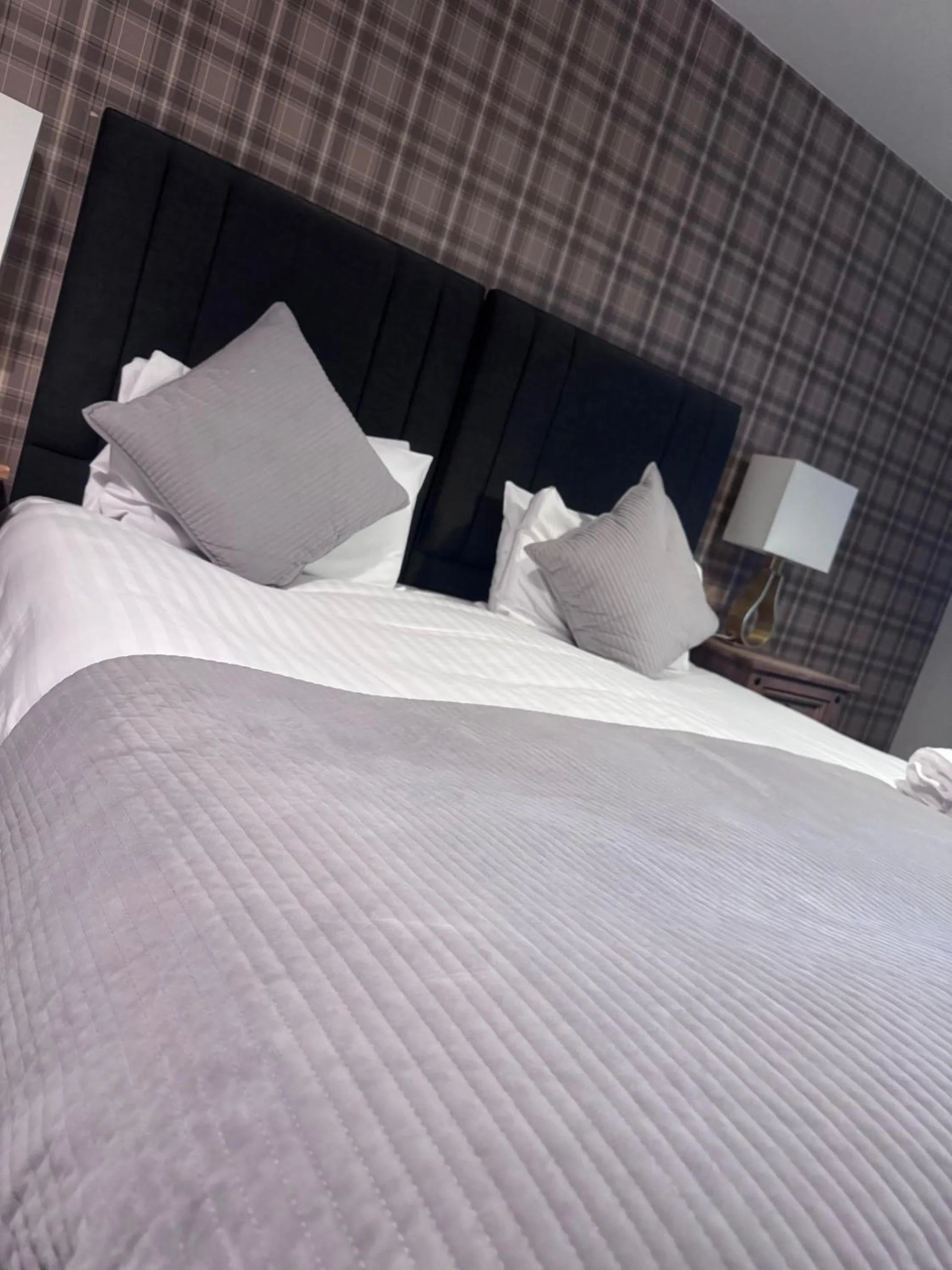 Bed in The Oaks Hotel