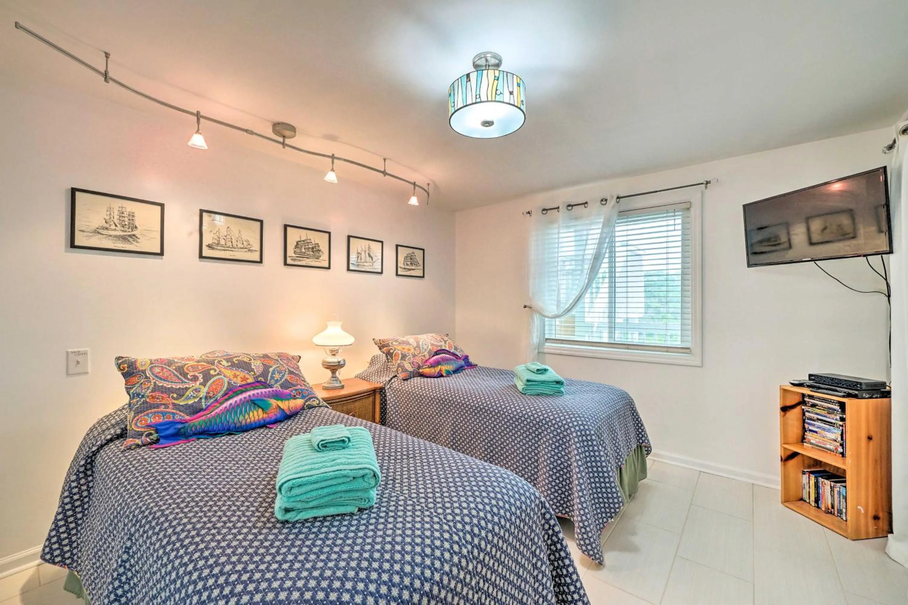 Bed in Ocean Dunes Kure Beach Condo with Balcony and Pool
