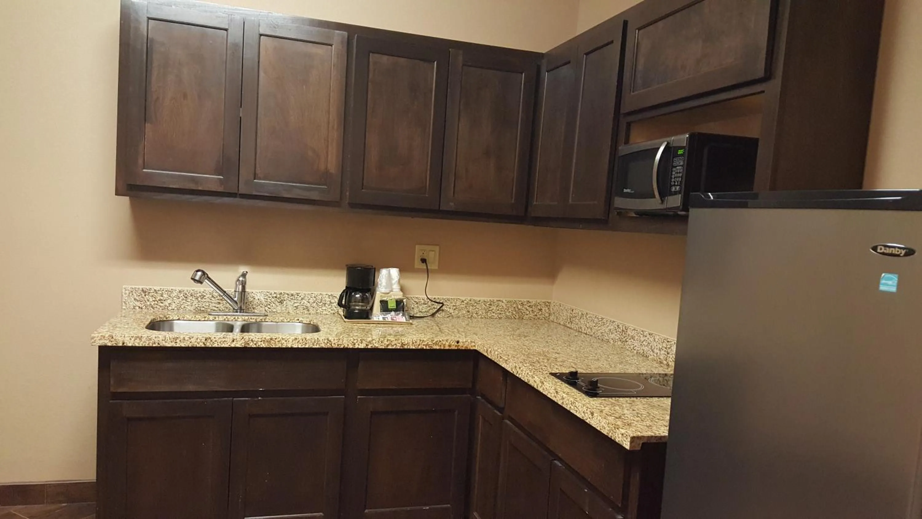 Kitchen or kitchenette in Executive Inn & Suites