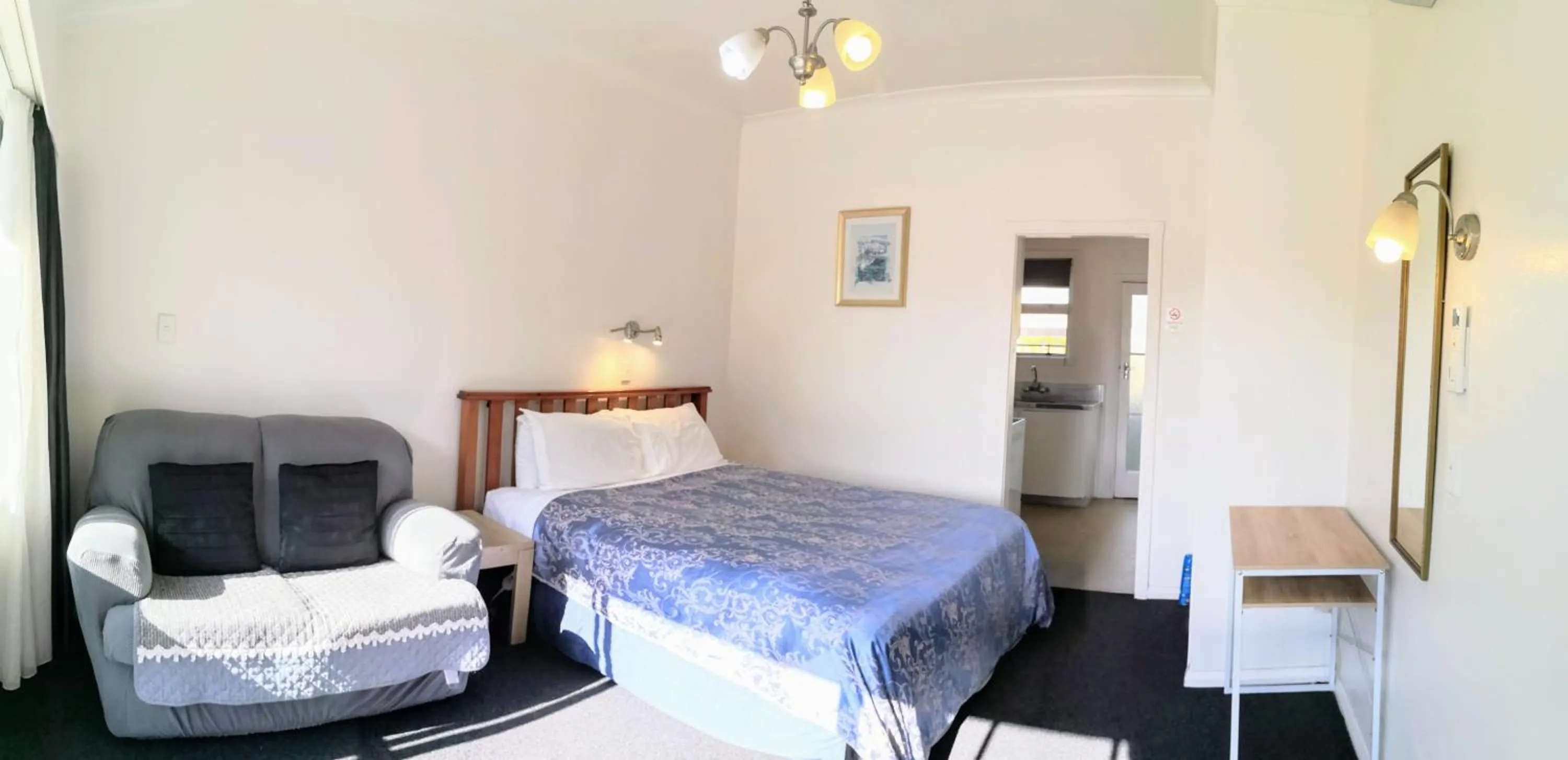 Bed in Cambrian Lodge Motel