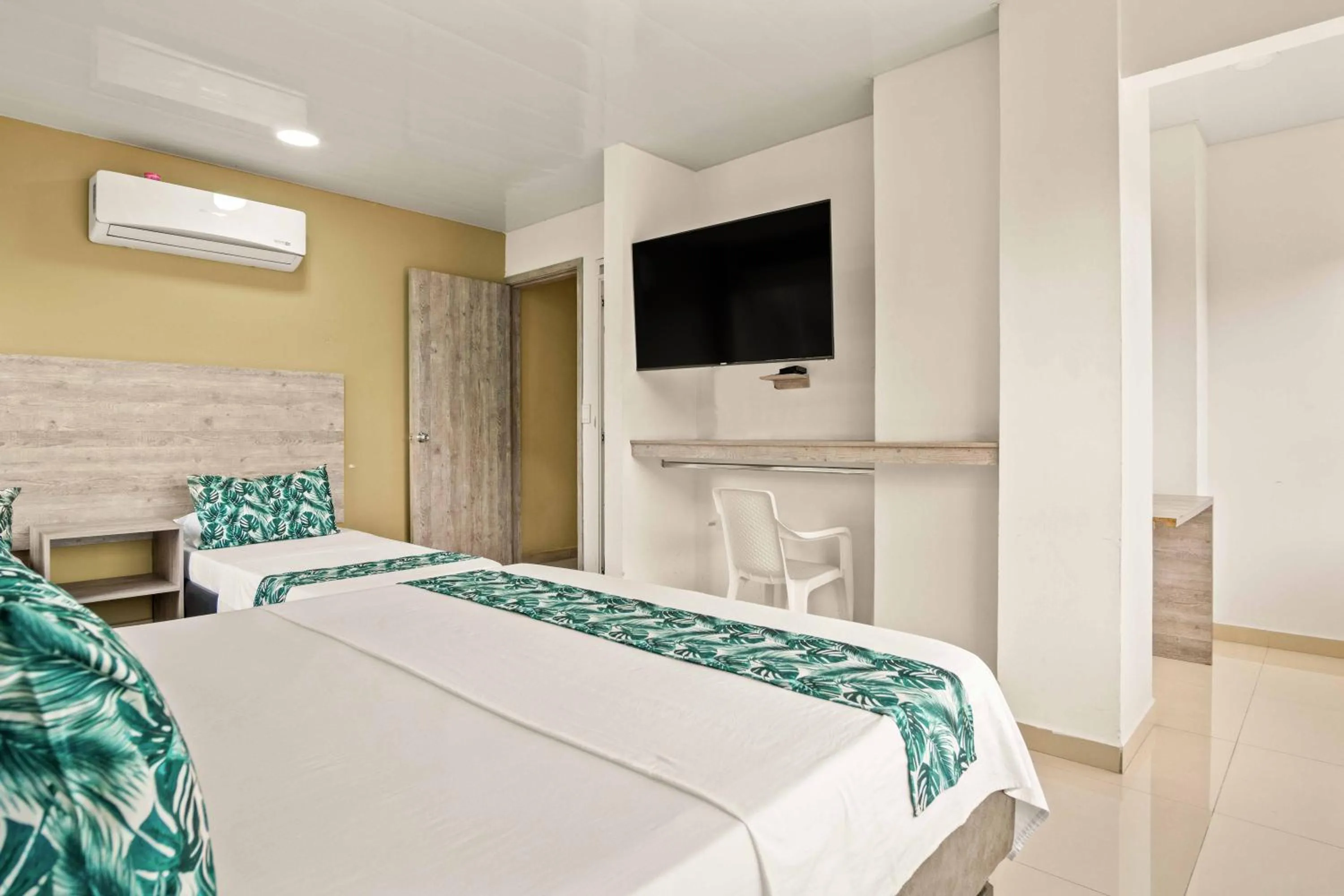 Bed in Aparta Hotel EcoSuite