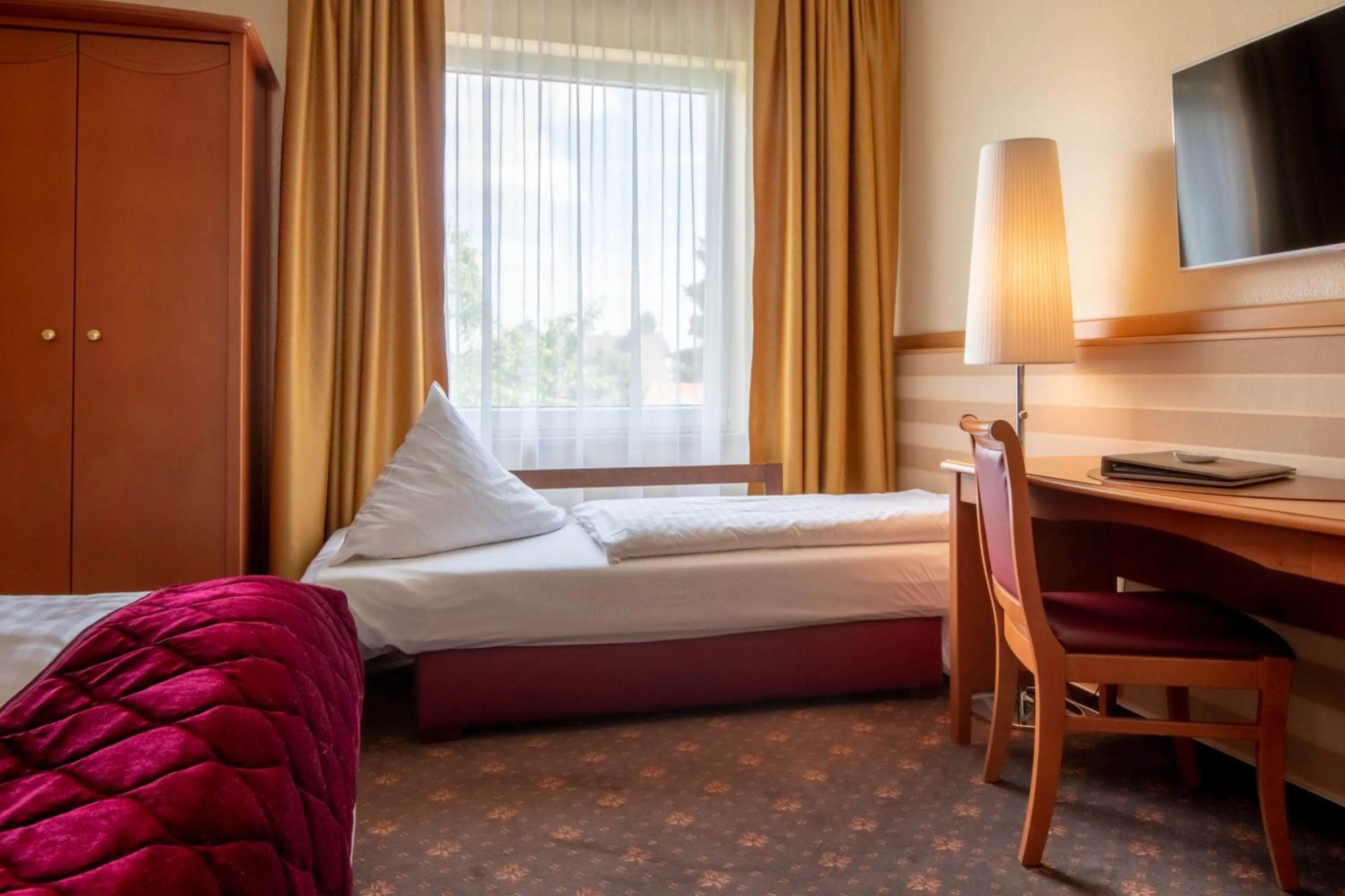 Bed in Hotel Wegner - T h e culinary art hotel