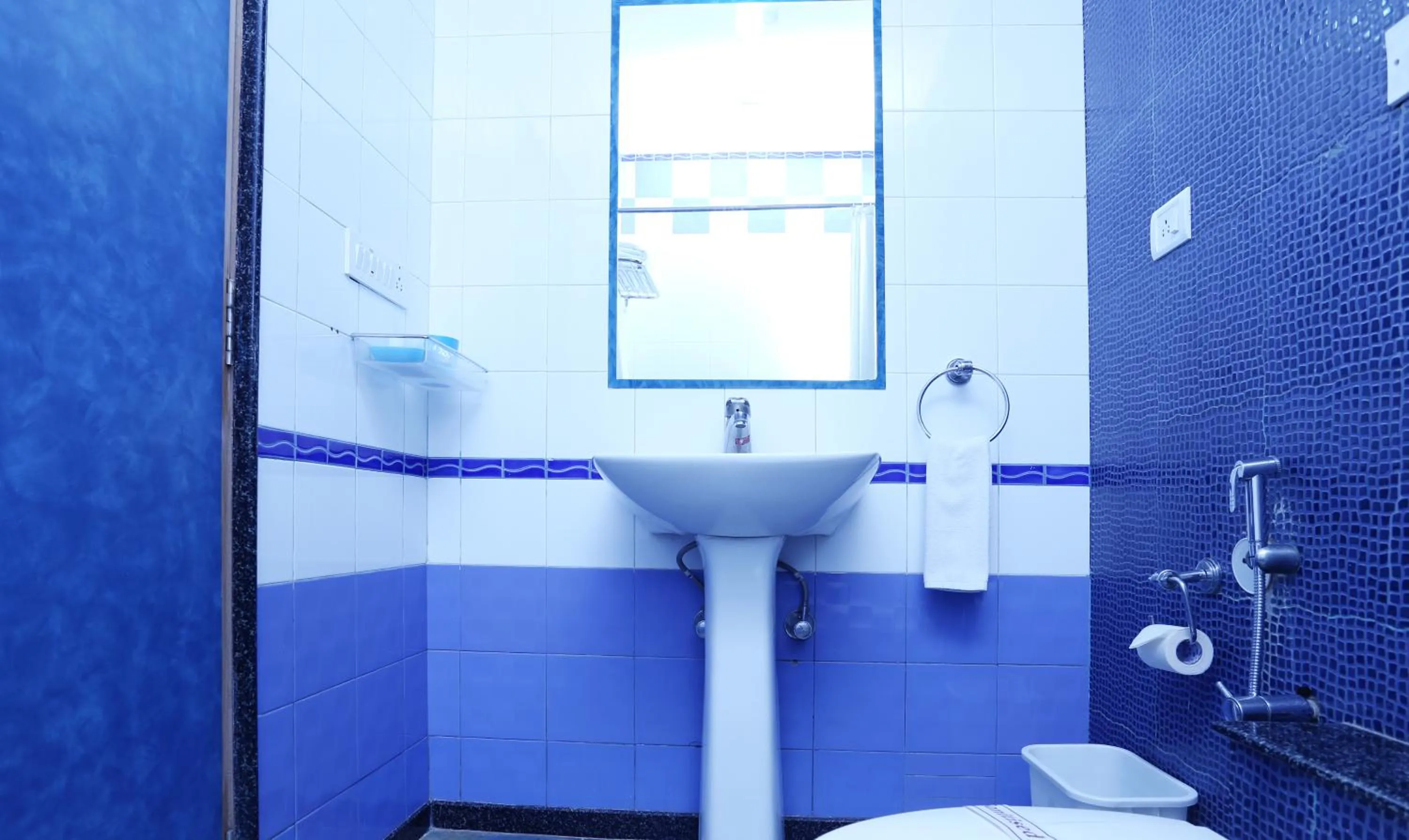 Toilet in Treebo Edha Suites Koramangala