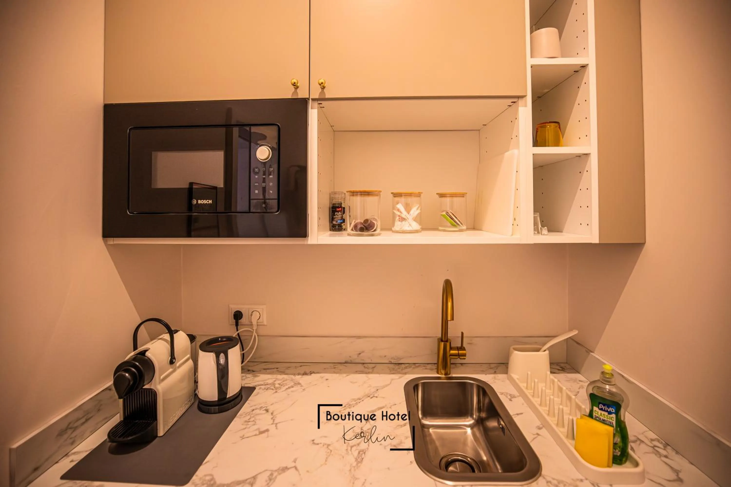 Kitchen or kitchenette in Boutique Hotel Kerlin