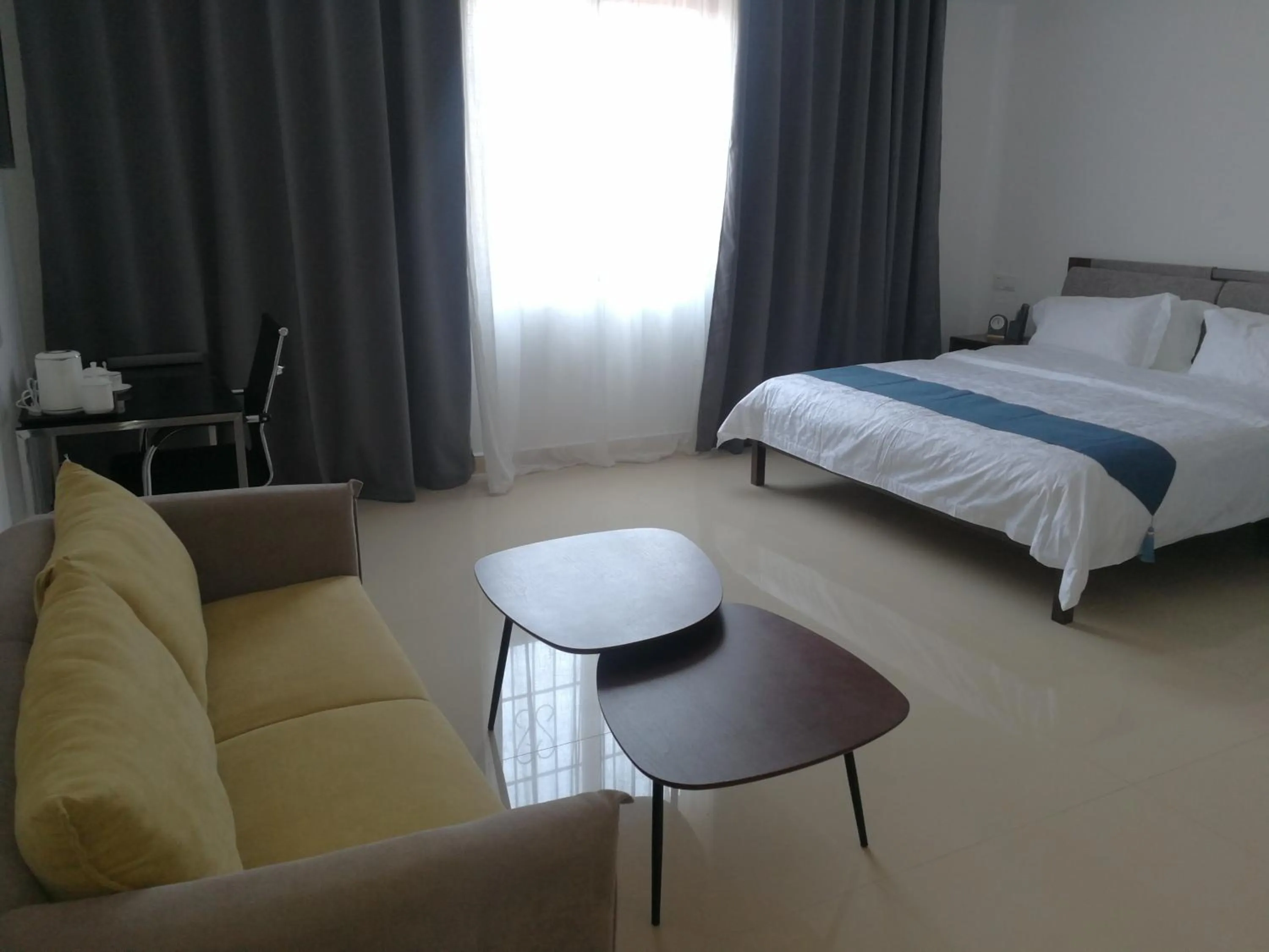 Photo of the whole room, Bed in Feima Hotel