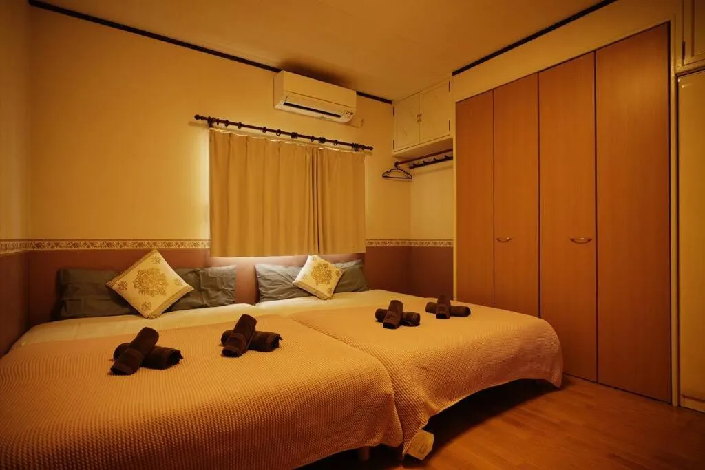 Bed in CHATAN SEASIDE FLAT VILLA