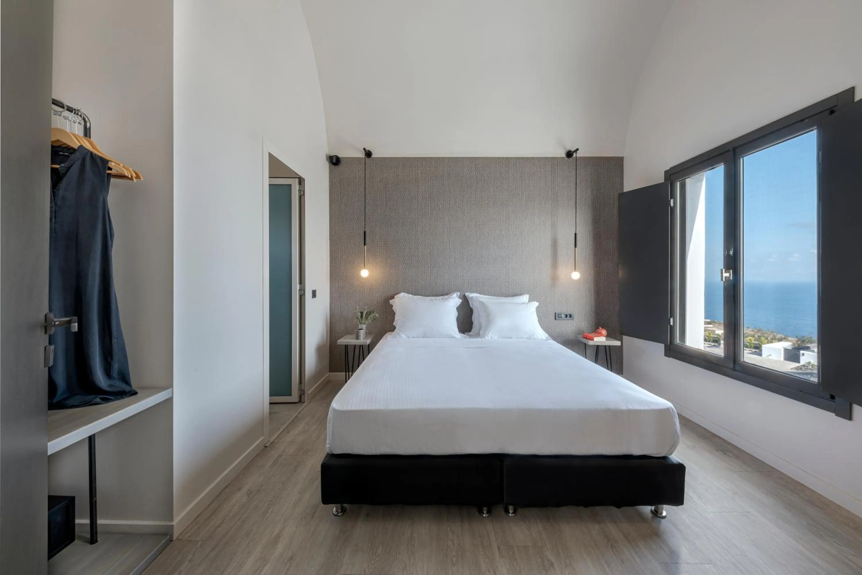 Bed in Pearl Inn Hotel by Pearl Hotel Collection