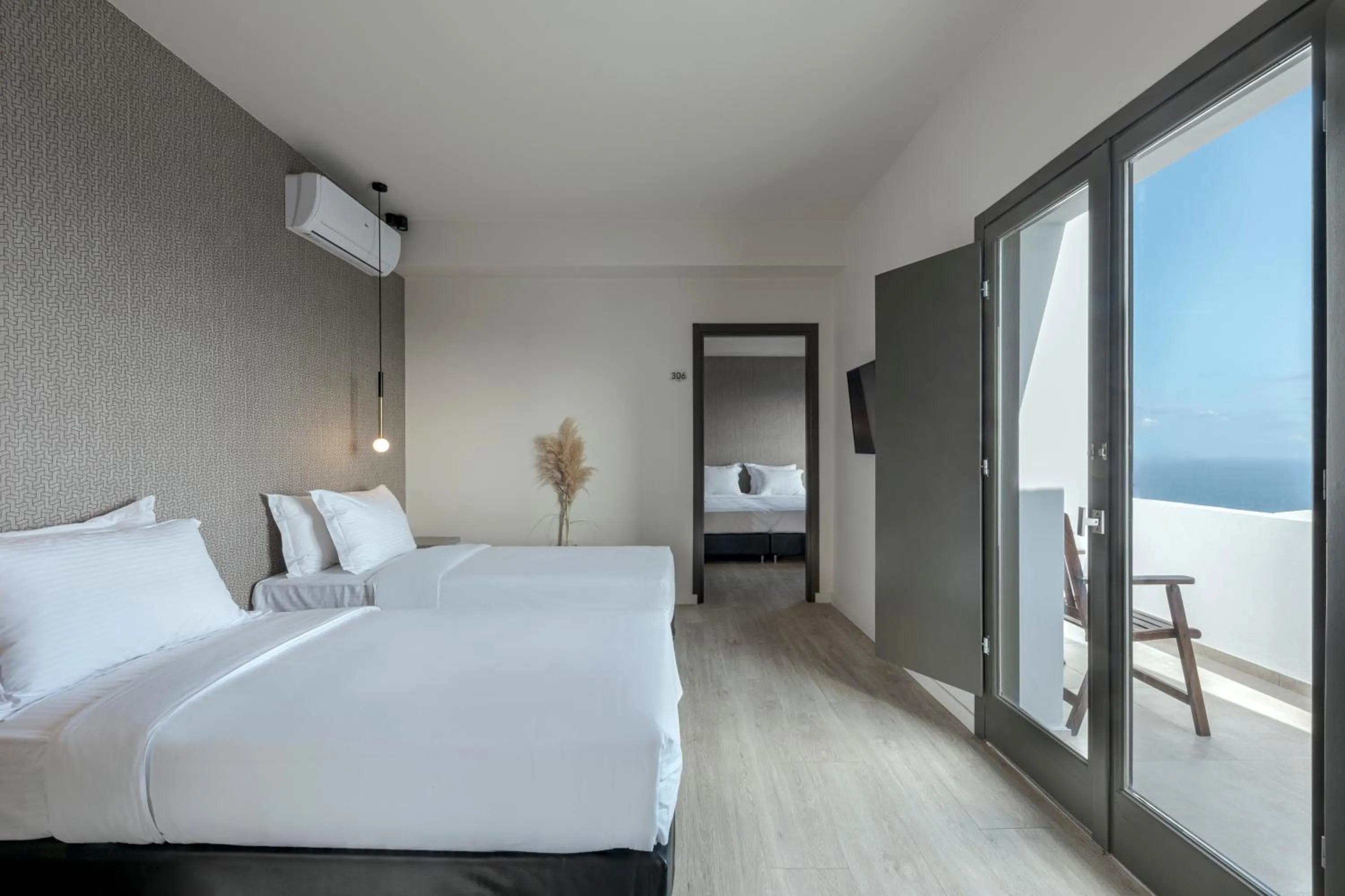 Bed in Pearl Inn Hotel by Pearl Hotel Collection