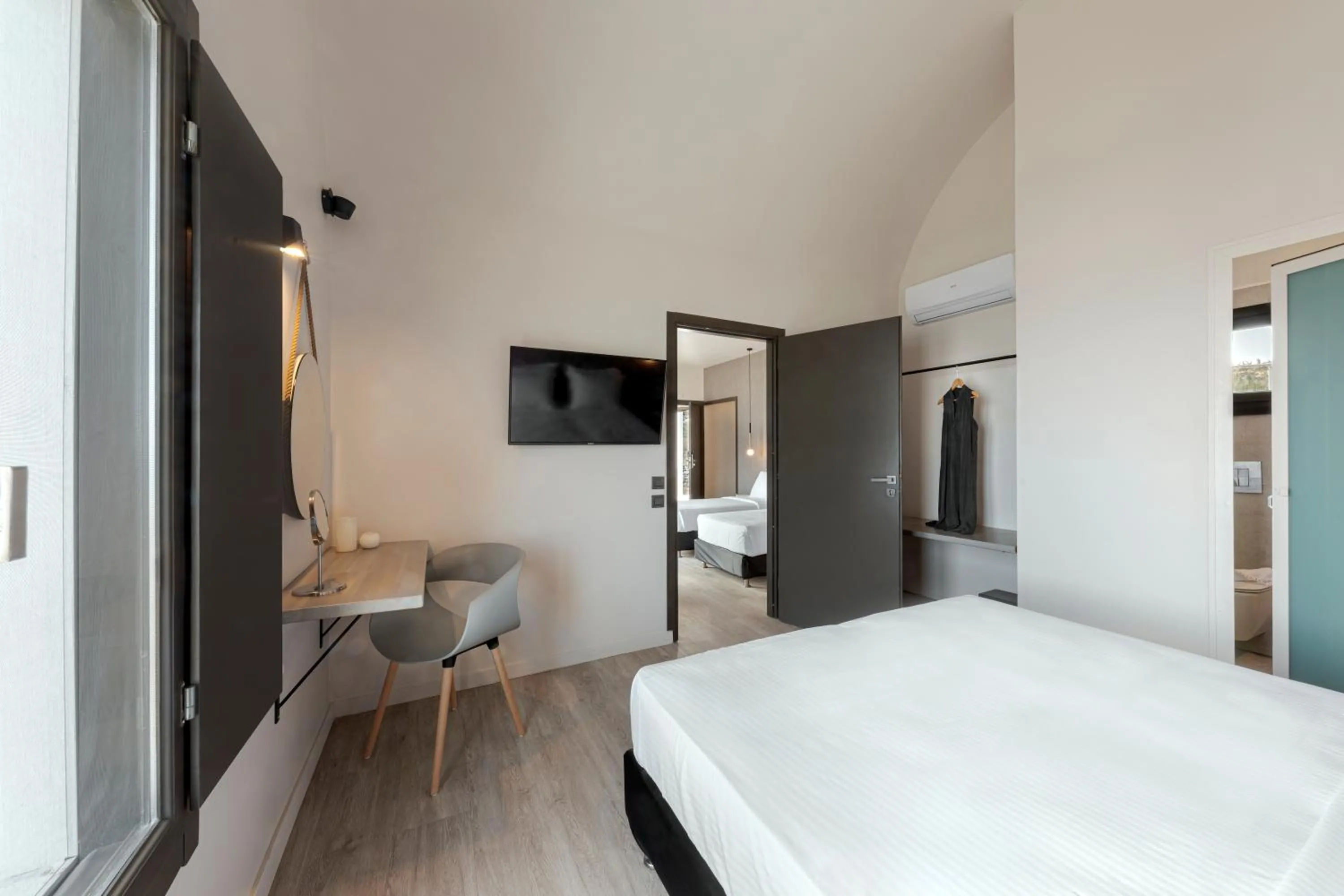 Bed in Pearl Inn Hotel by Pearl Hotel Collection
