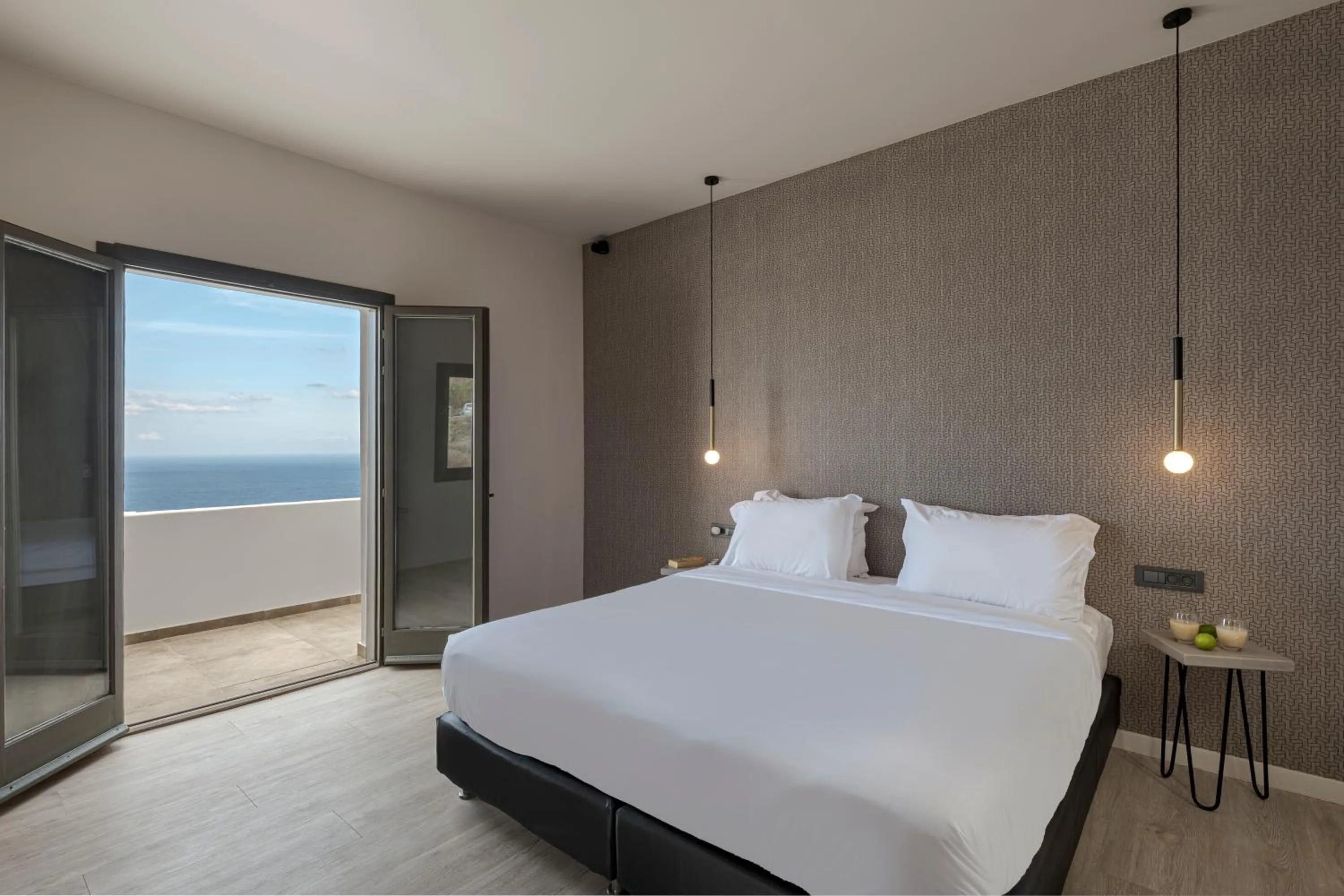 Bed in Pearl Inn Hotel by Pearl Hotel Collection
