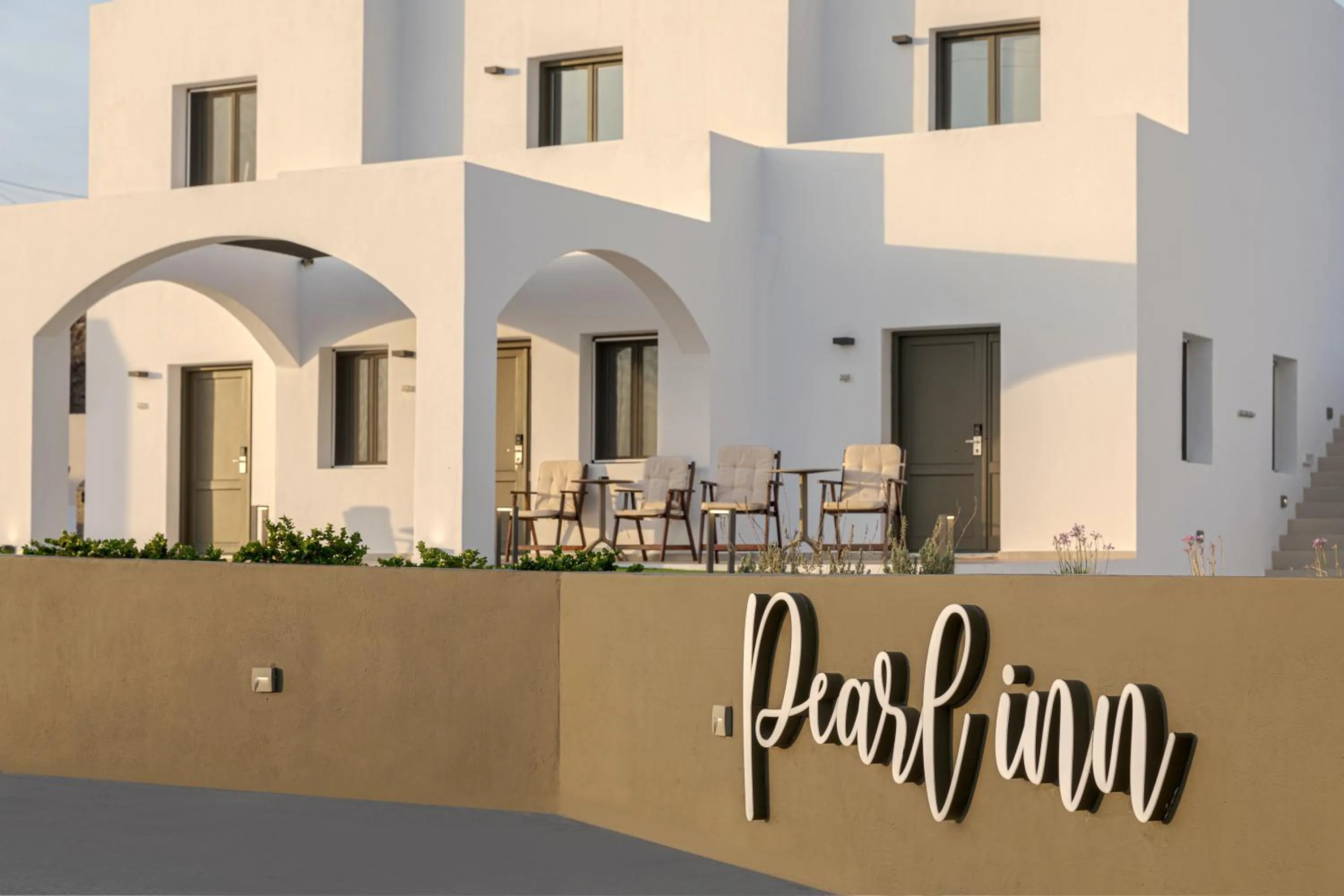 Property logo or sign in Pearl Inn Hotel by Pearl Hotel Collection