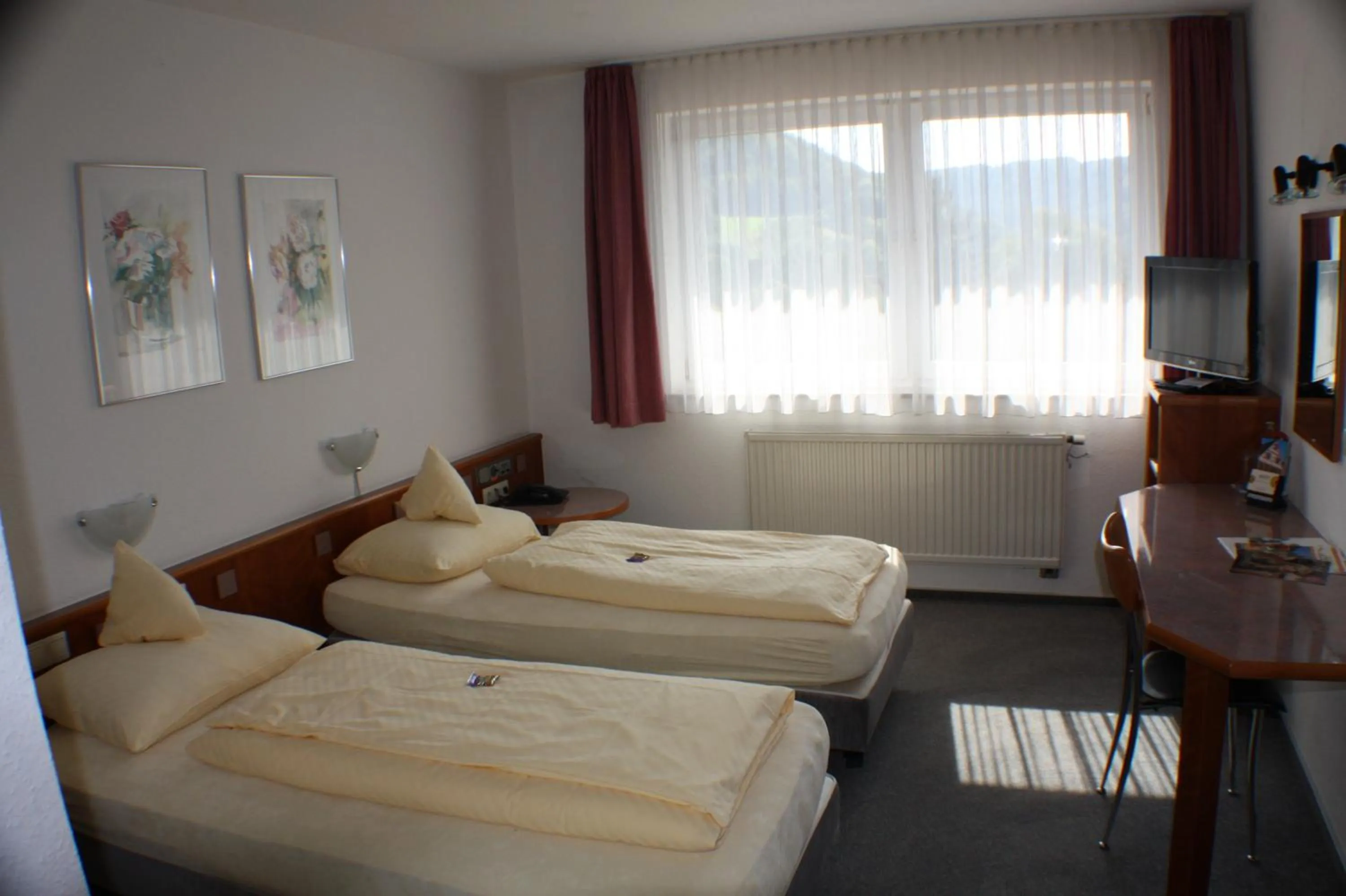Photo of the whole room, Bed in Akzent Hotel Goldener Ochsen