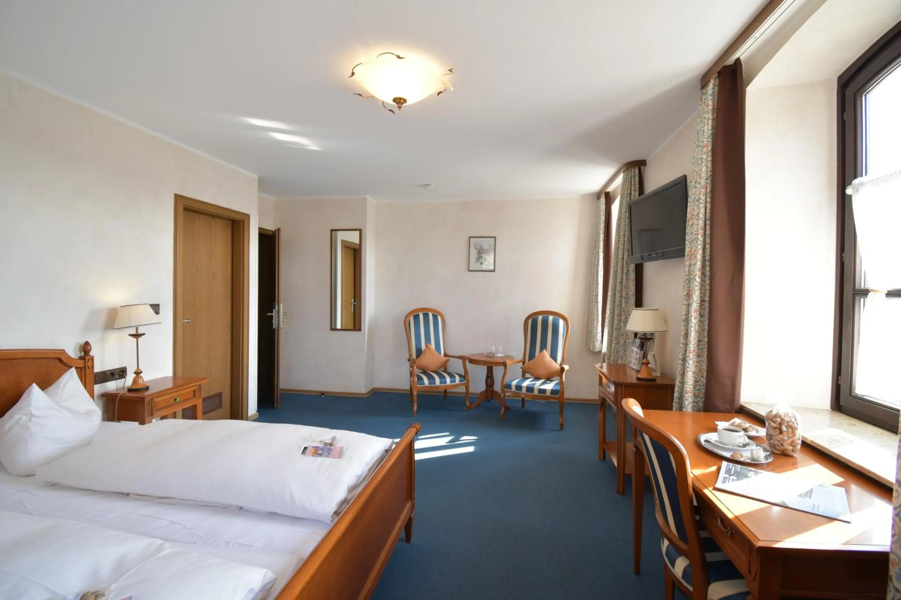 Photo of the whole room, Bed in AKZENT Hotel Franziskaner