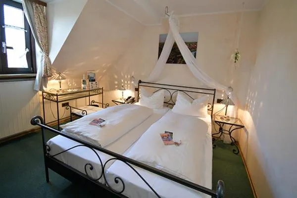 Bed in AKZENT Hotel Franziskaner