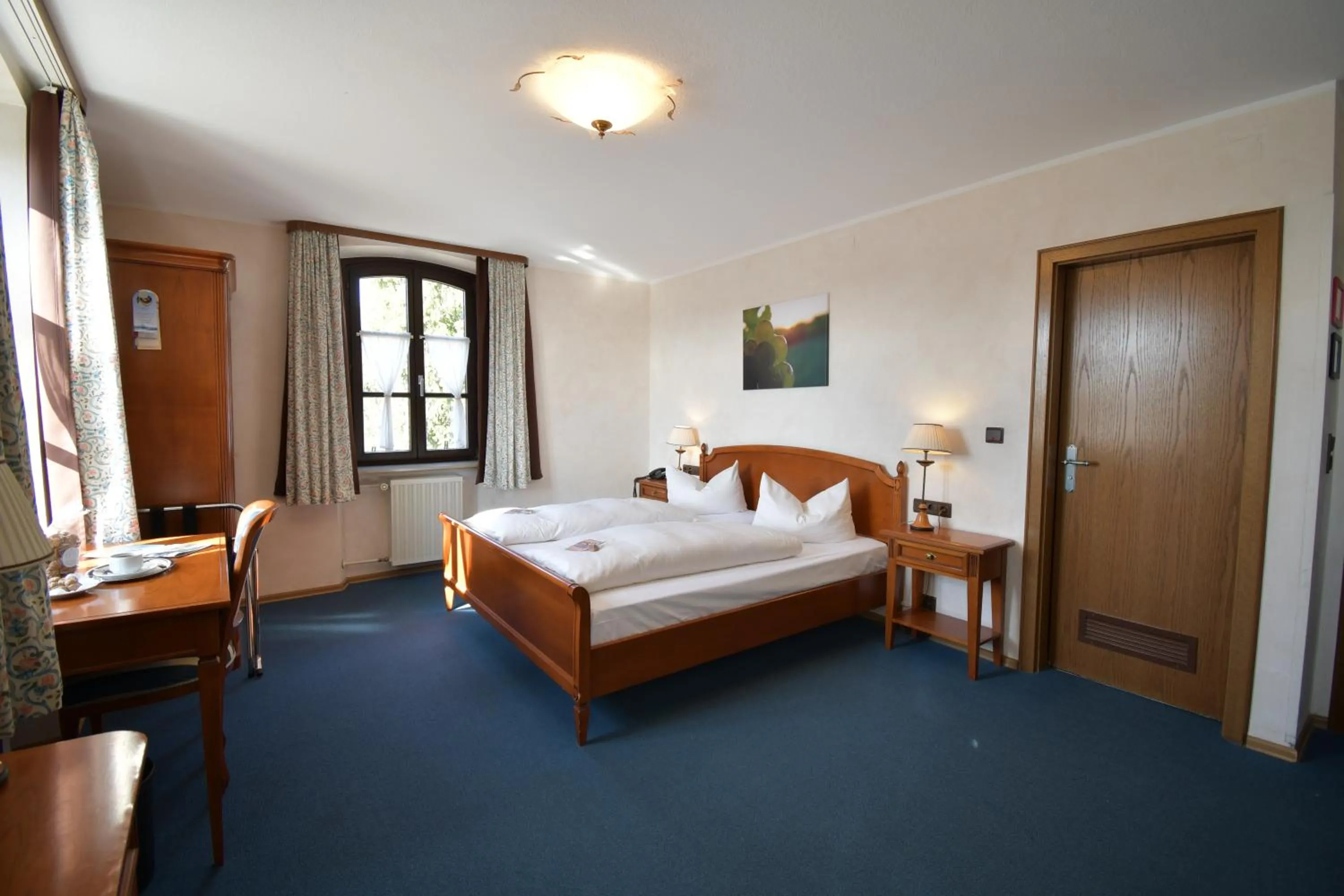 Photo of the whole room, Bed in AKZENT Hotel Franziskaner