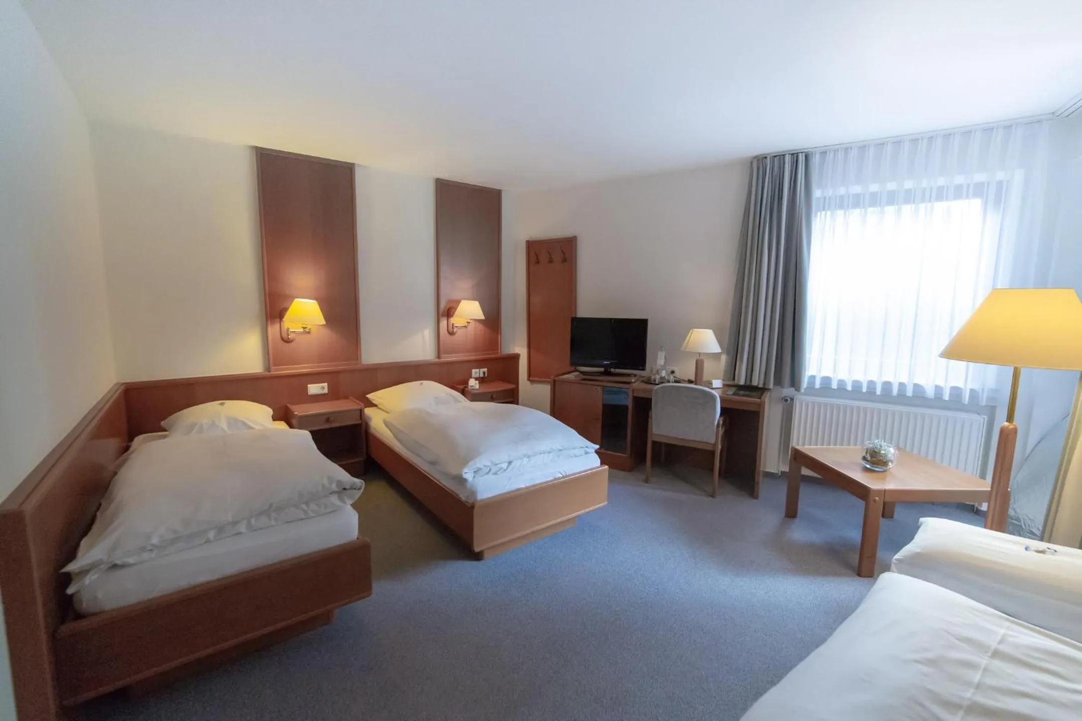 Bed in AKZENT Hotel Thiemann