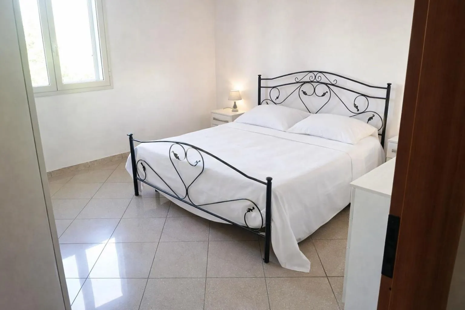 Photo of the whole room, Bed in Residence Ionian Gallipoli