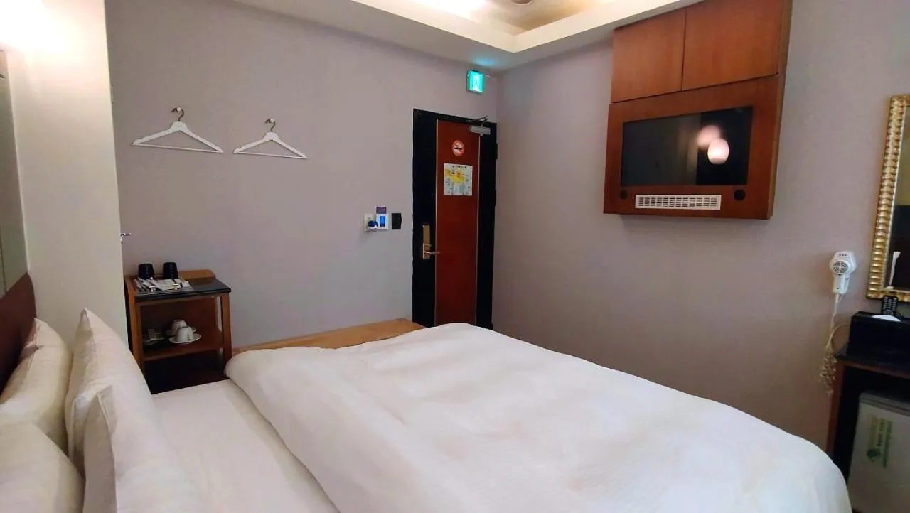 Bed in Jin Yong Quan Spa Hotspring Resort