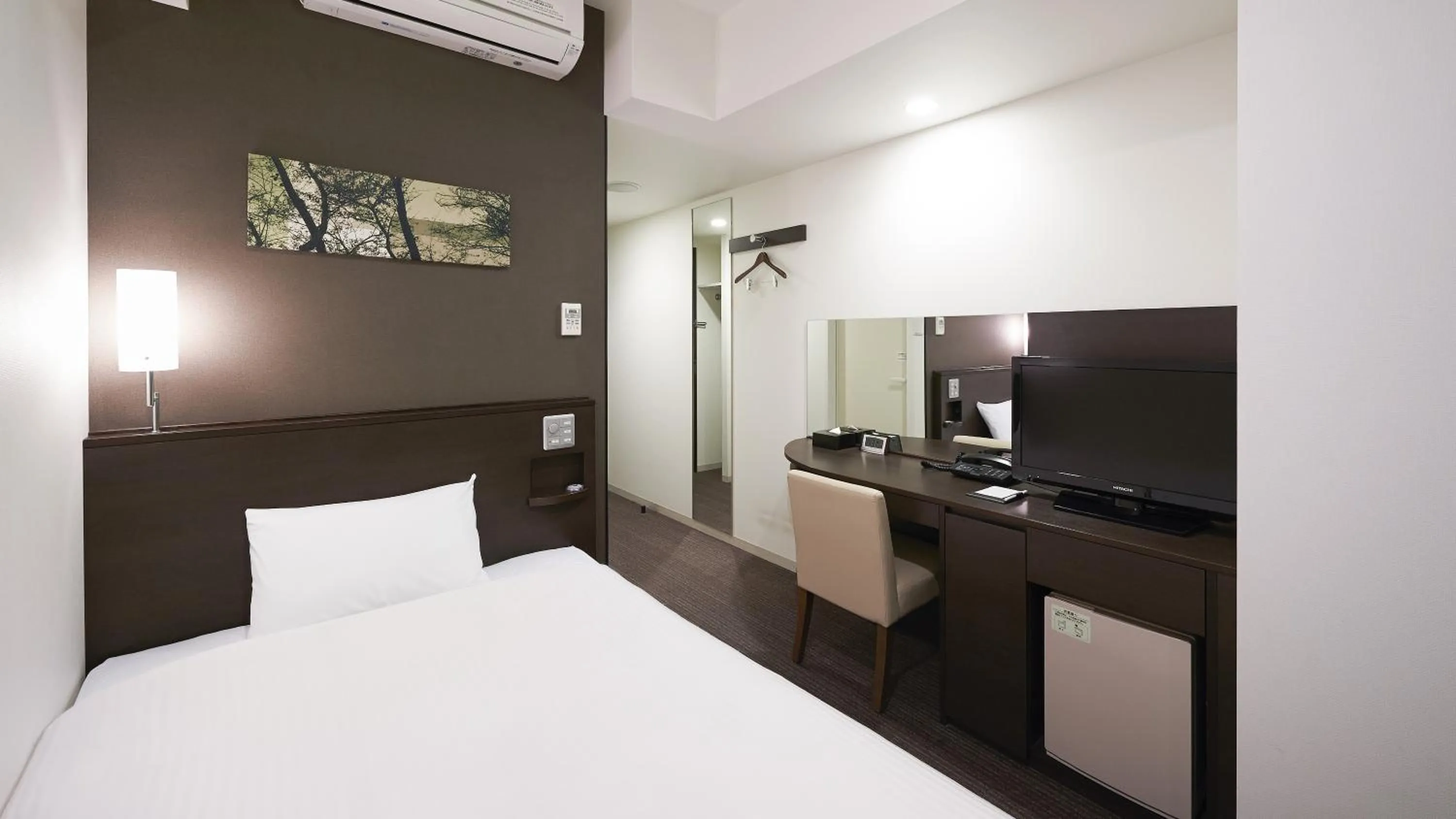 Bed in Sotetsu Fresa Inn Chiba Kashiwa