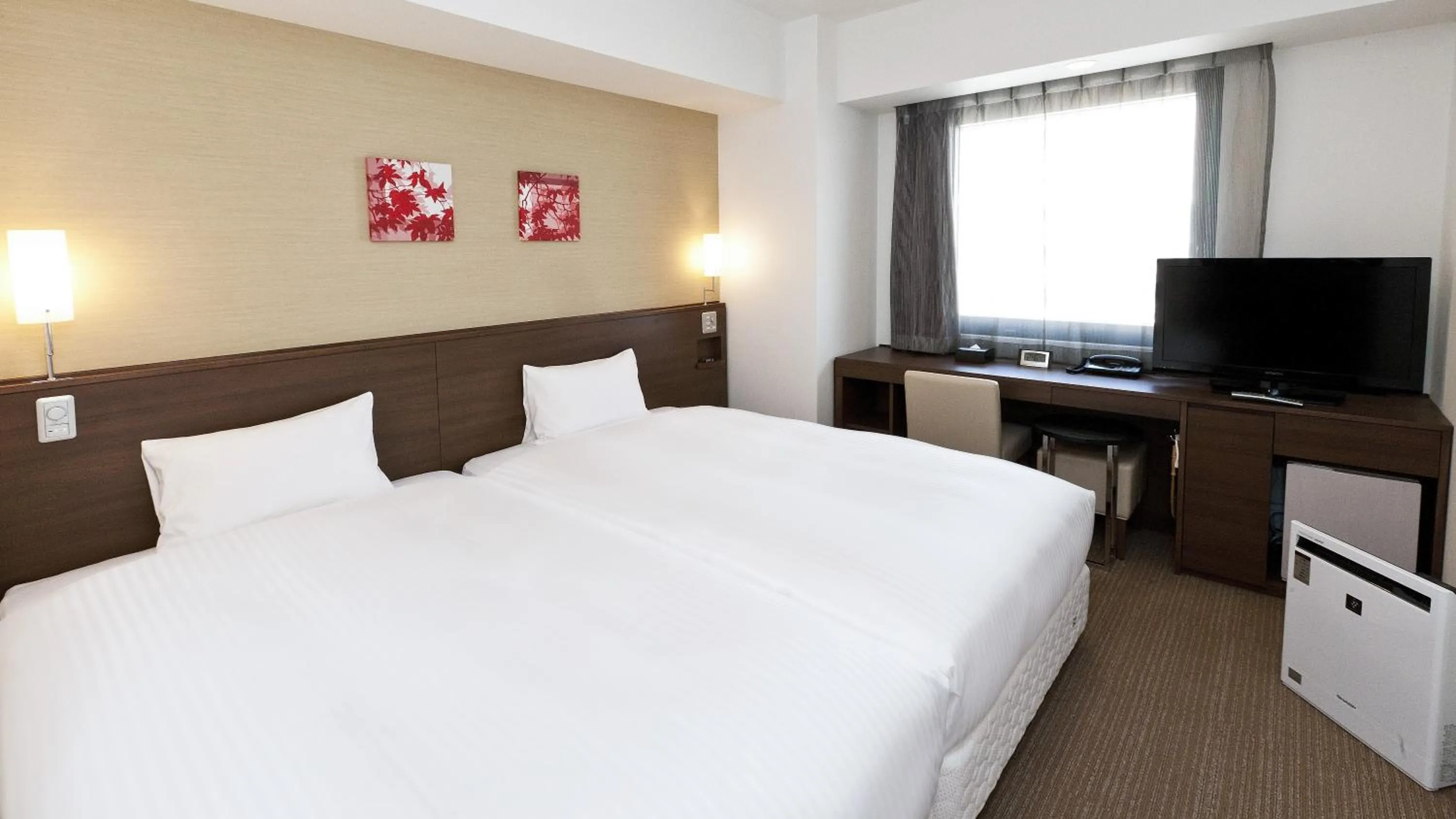 Bed in Sotetsu Fresa Inn Chiba Kashiwa