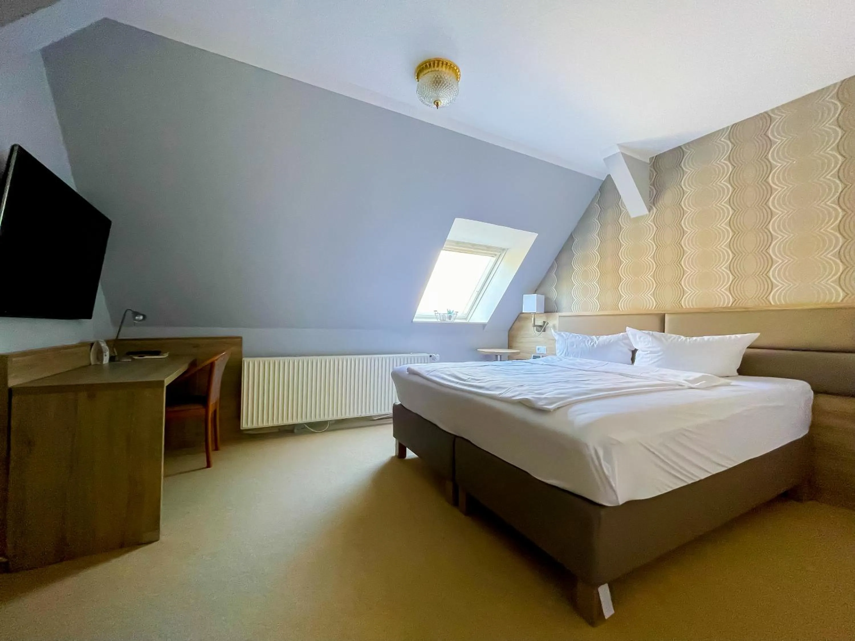 Bed in Hotel Saltenhof