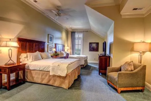 Bed in Cottages and Suites at River Landing
