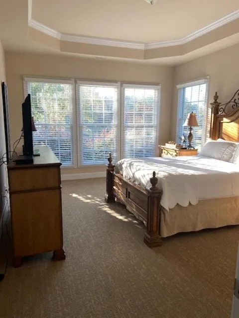 Bed in Cottages and Suites at River Landing