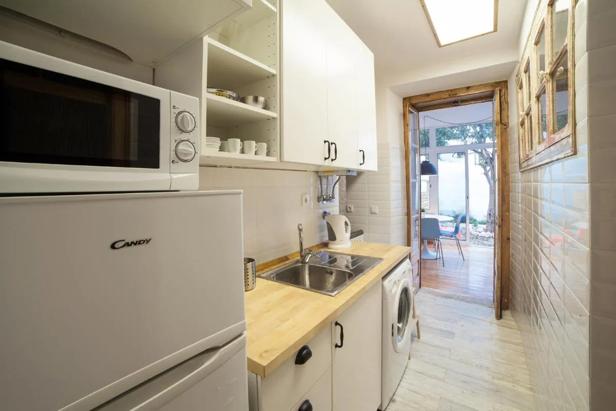Kitchen or kitchenette in FLH Lisbon Sun Terrace Graça II