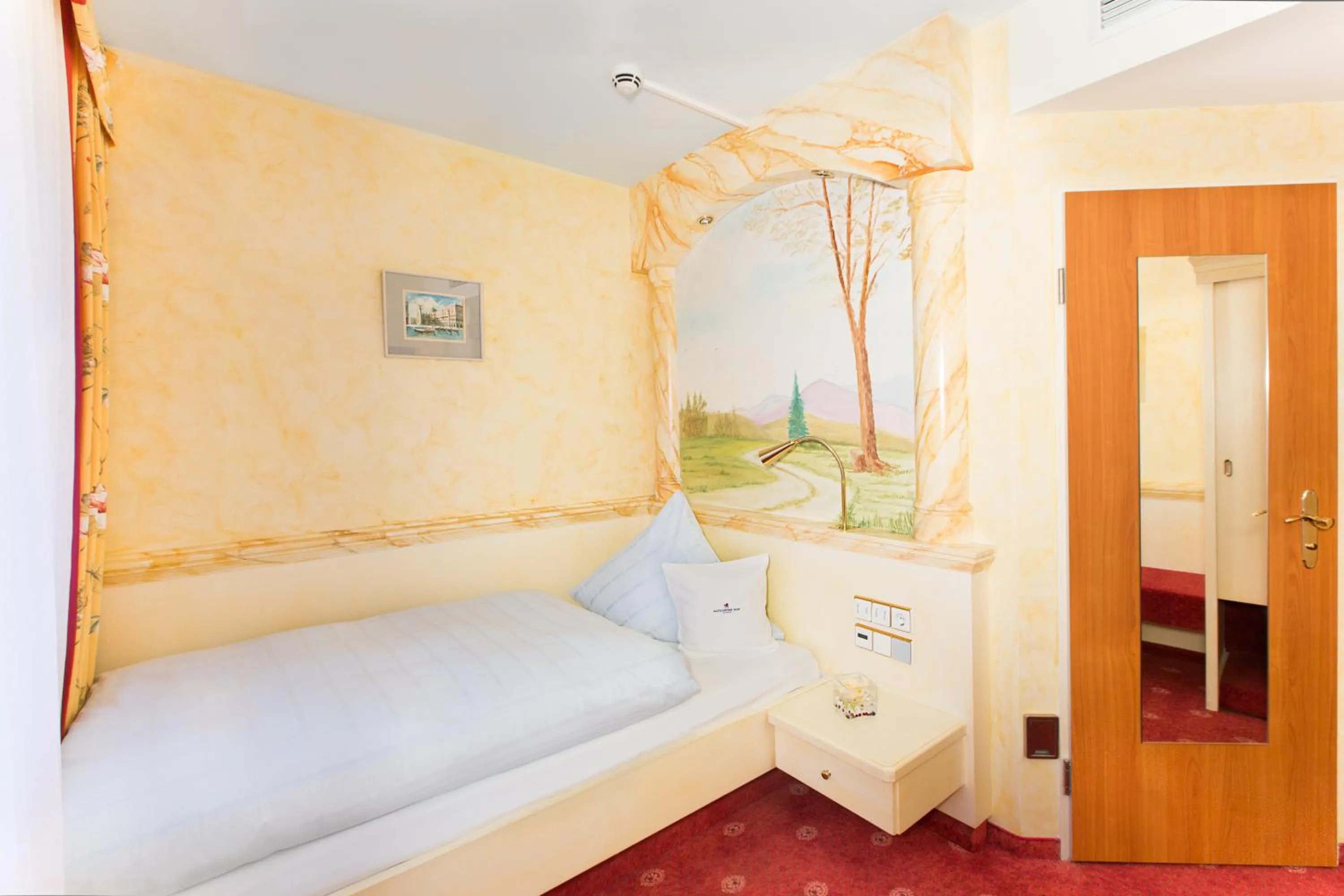 Photo of the whole room, Bed in AKZENT Hotel Restaurant Altdorfer Hof