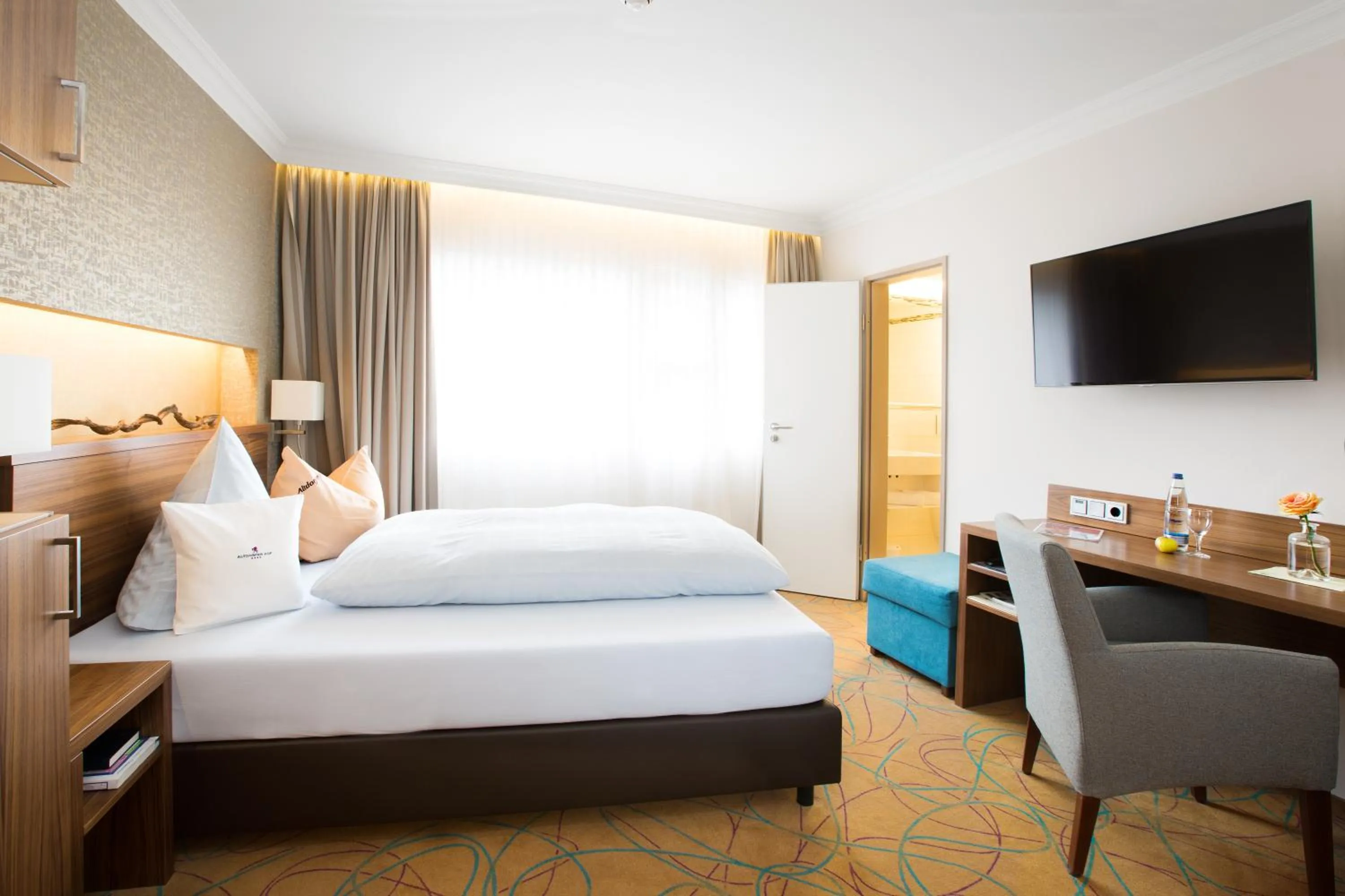 Photo of the whole room, Bed in AKZENT Hotel Restaurant Altdorfer Hof