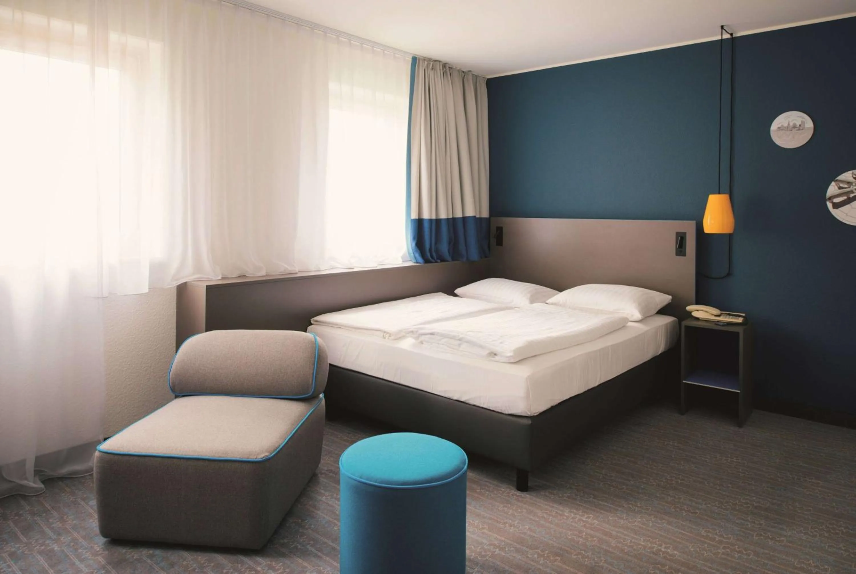 Photo of the whole room, Bed in Vienna House Easy by Wyndham Bad Oeynhausen