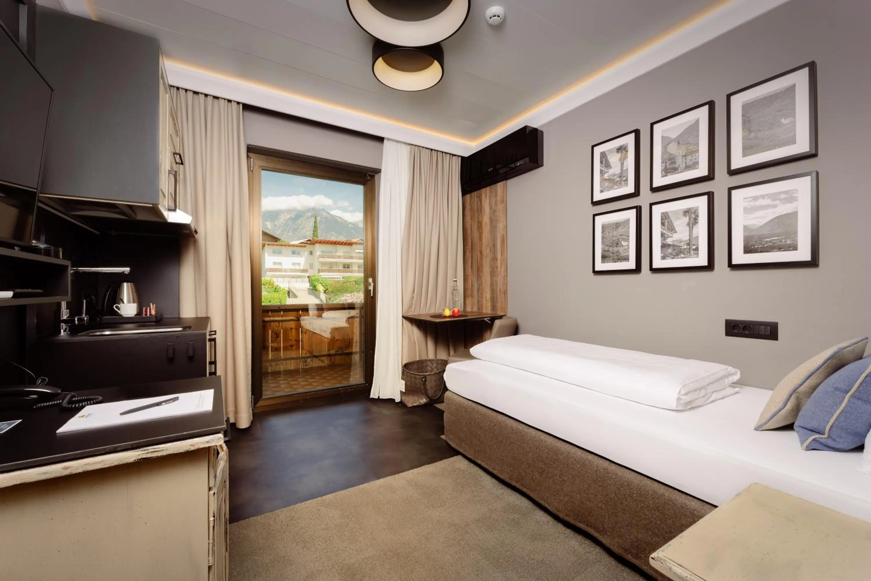 Photo of the whole room, Bed in MONDI Hotel Tscherms