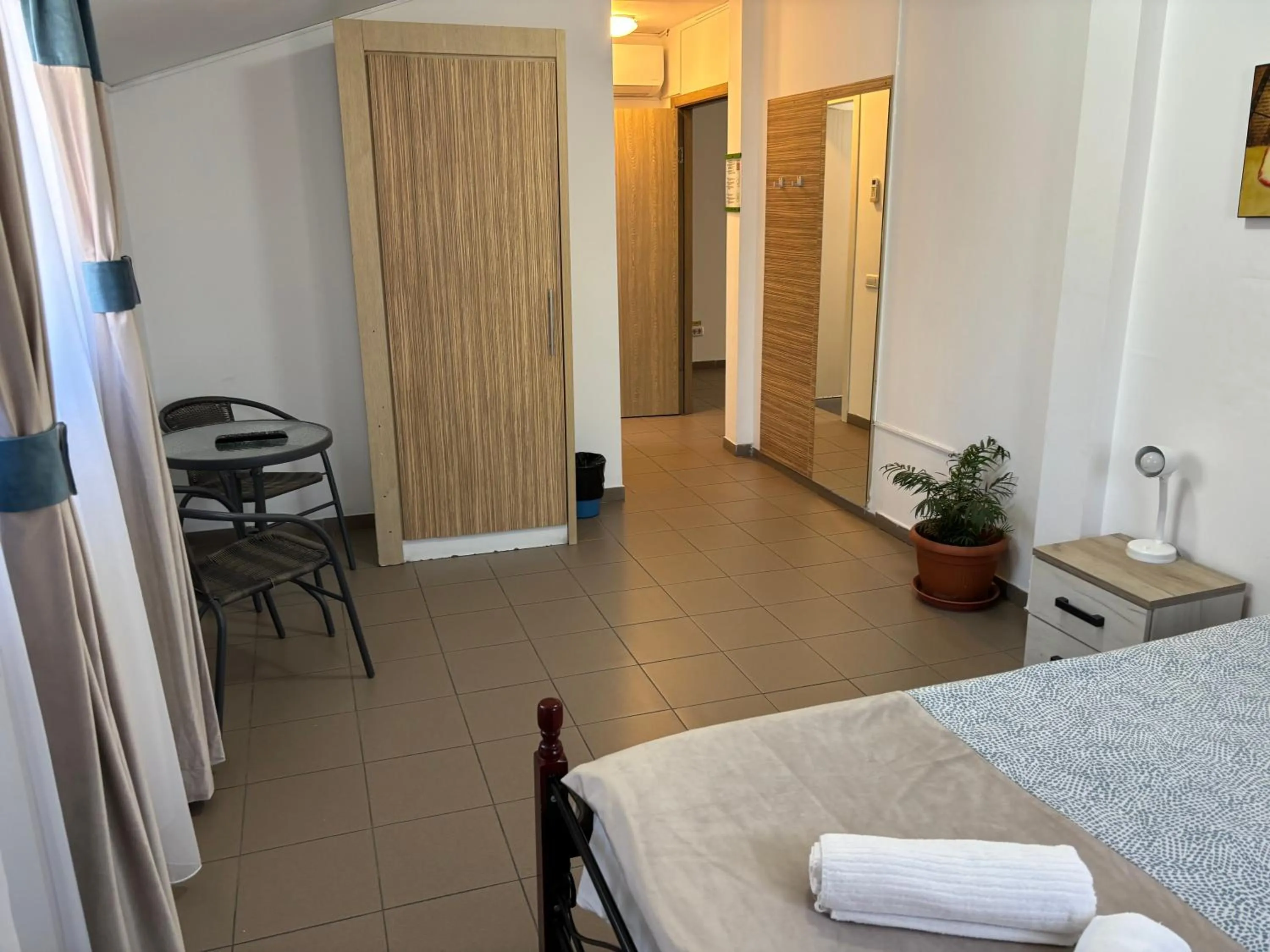 Bed in Piata Uniri Cozy Inn