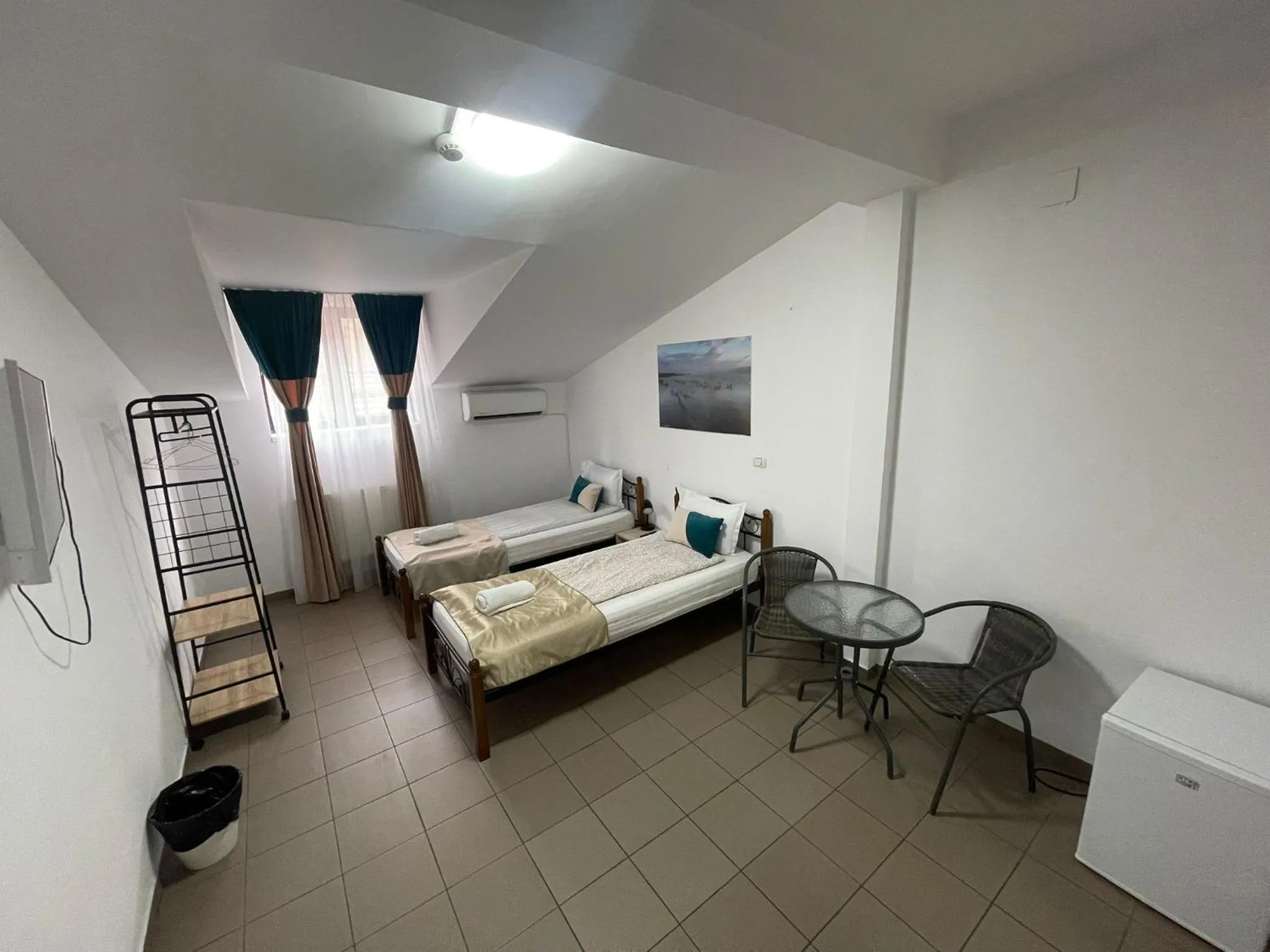 Bed in Piata Uniri Cozy Inn