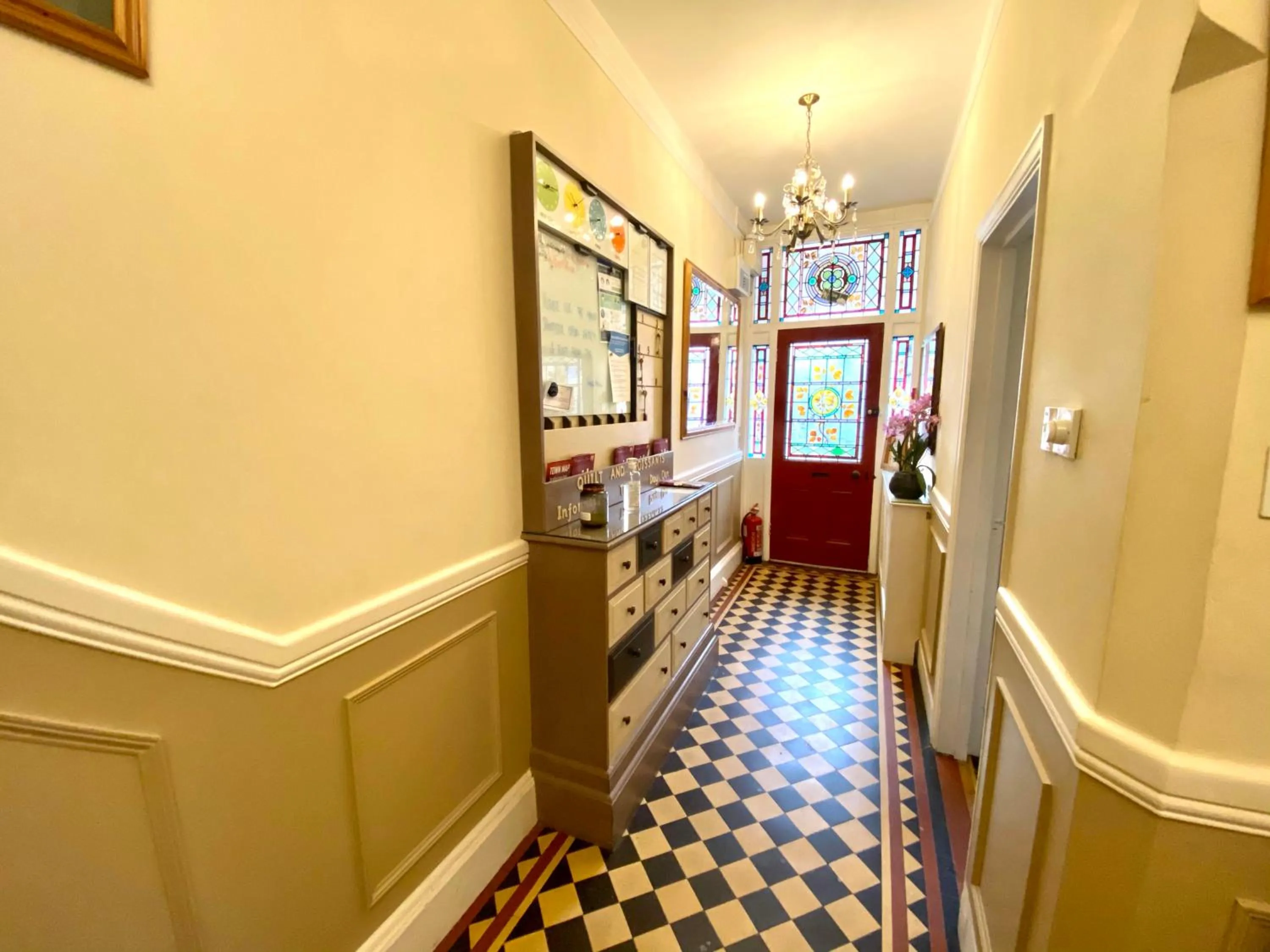 Lobby or reception, Bed in Quilt and Croissants Guest House