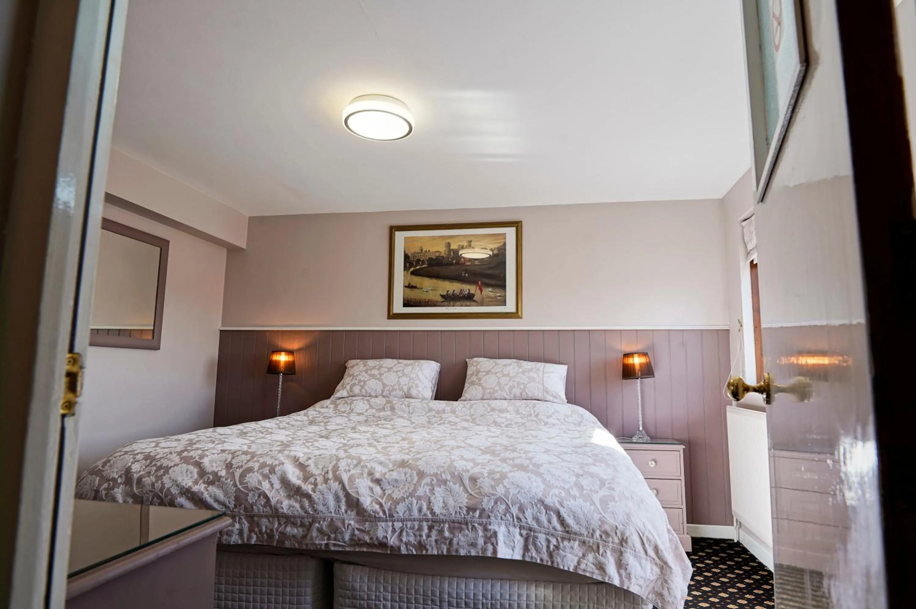 Bed in Quilt and Croissants Guest House