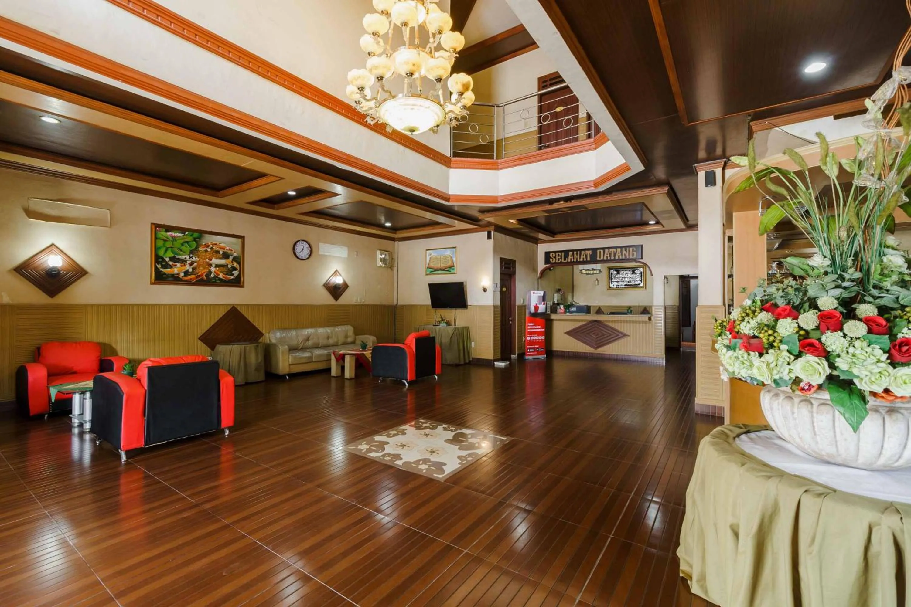 Facade/entrance in RedDoorz near RS Harapan Pematang Siantar