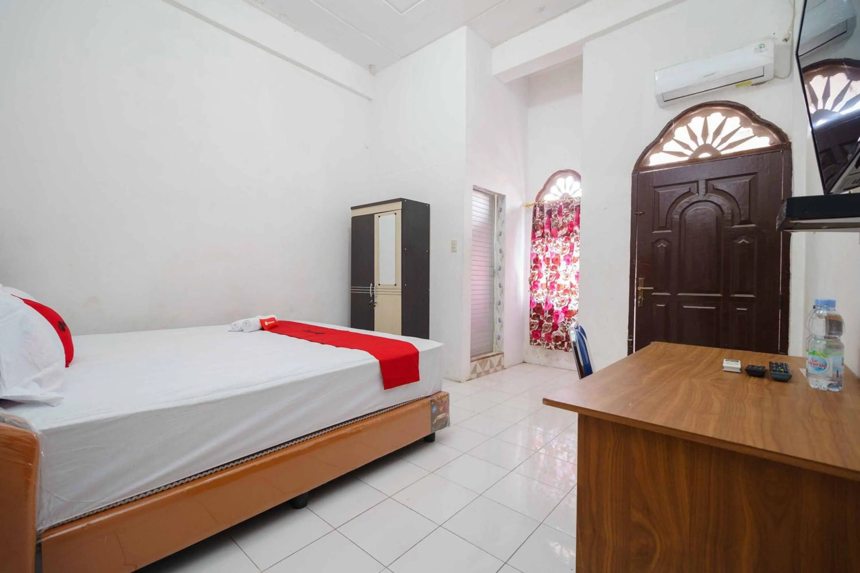 Bedroom in RedDoorz Syariah near Stasiun Kereta Api Kisaran