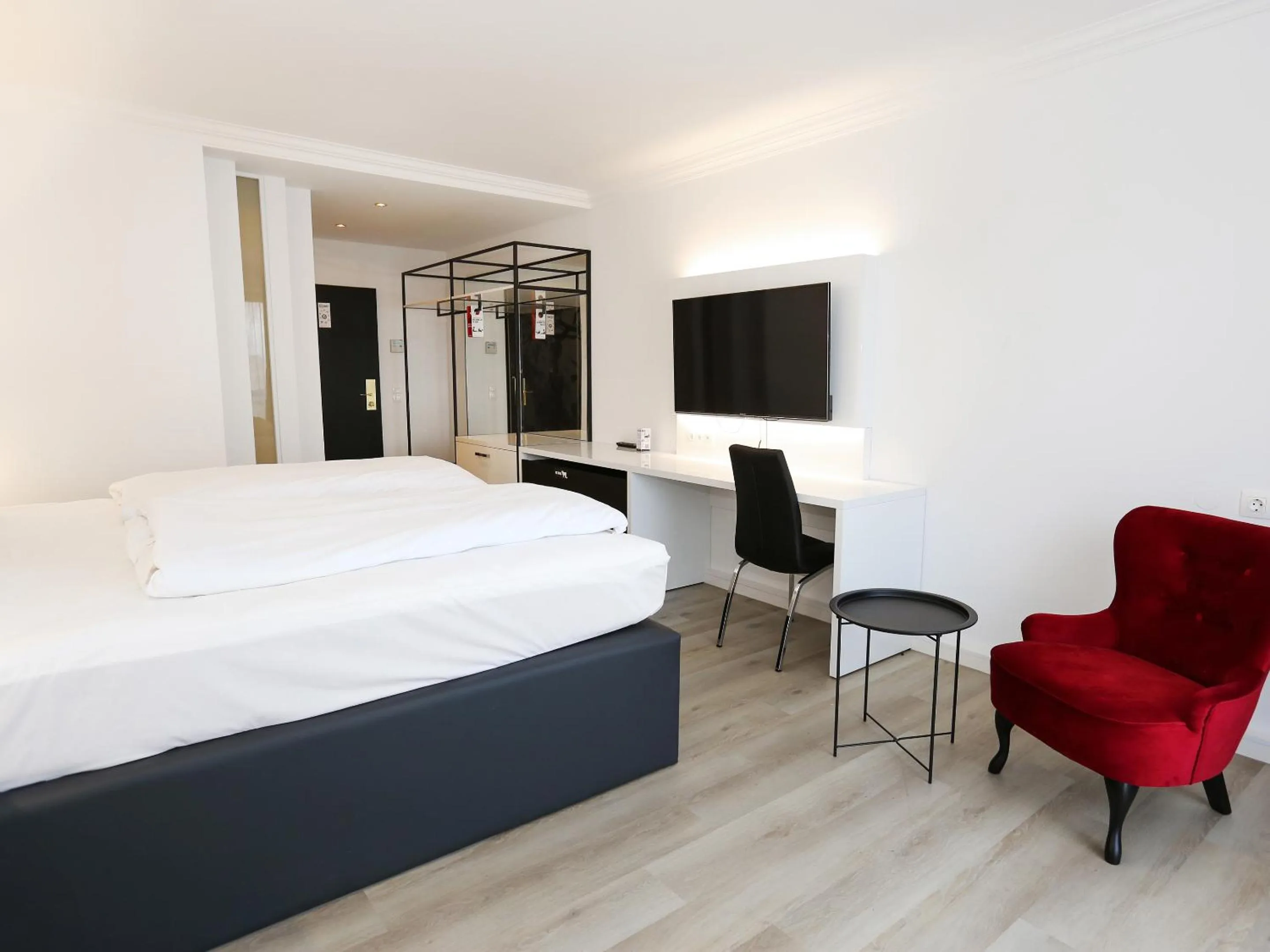 Photo of the whole room, Bed in DORMERO Hotel Meerbusch